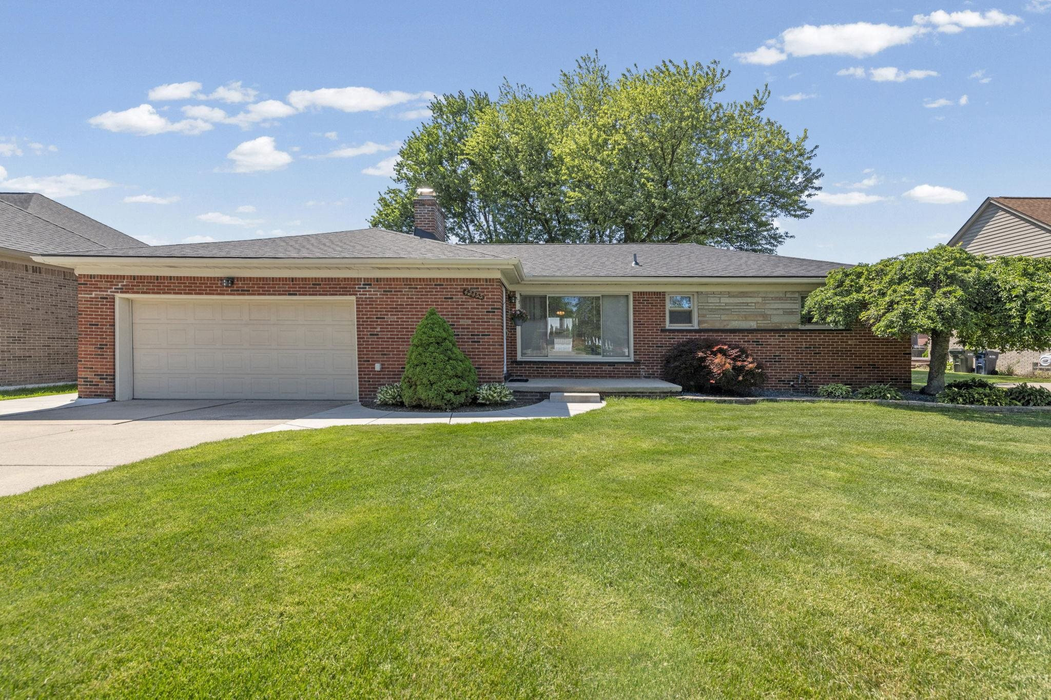 42355 Tessmer Drive, Sterling Heights, MI 48314 — front exterior