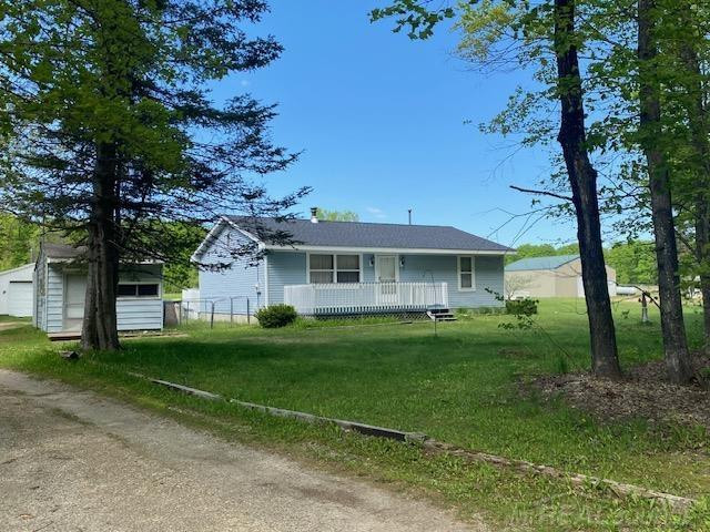 7483 NE Twin lake Road, Mancelona, MI 49659 — front exterior