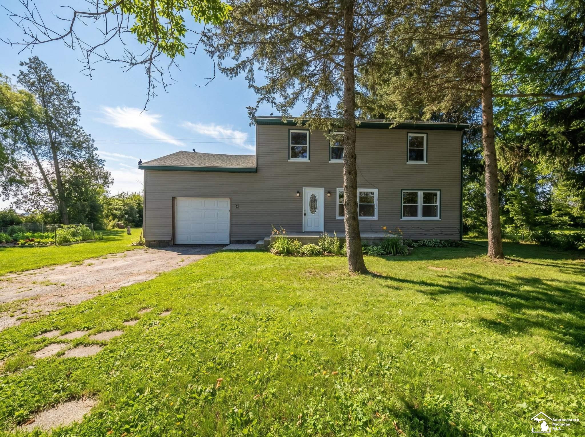 8745 E Monroe Road, Britton, MI 49229 — front exterior
