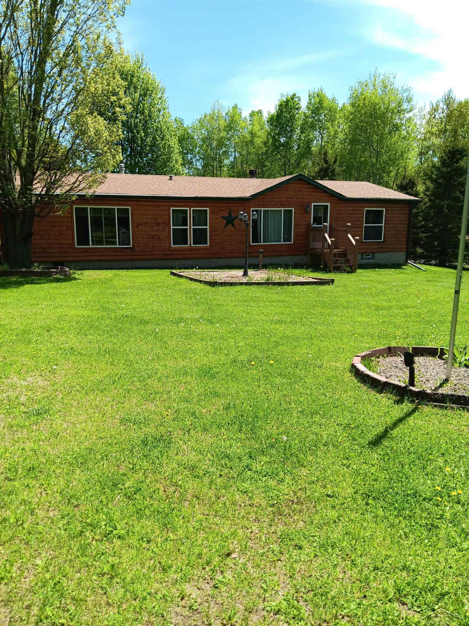 8 W County Rd 424 Road, Gaastra, MI — front exterior