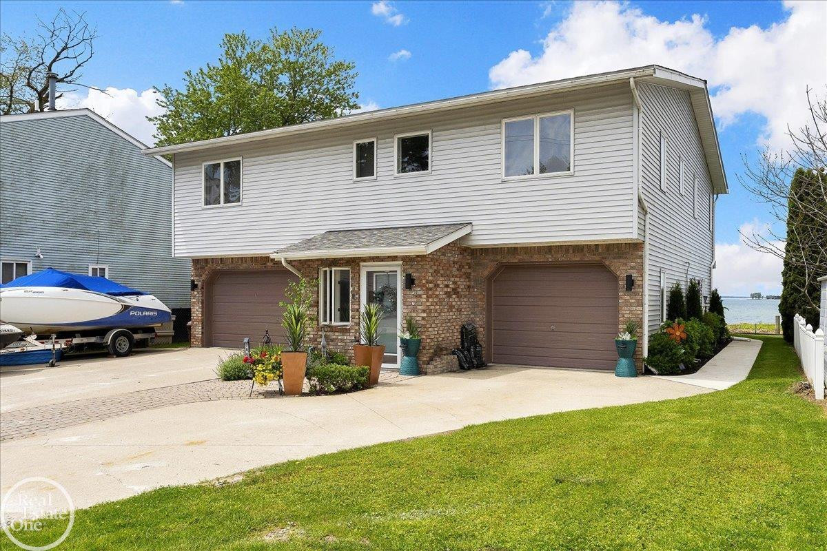 7860 Belle Brae Lane, MI — front exterior