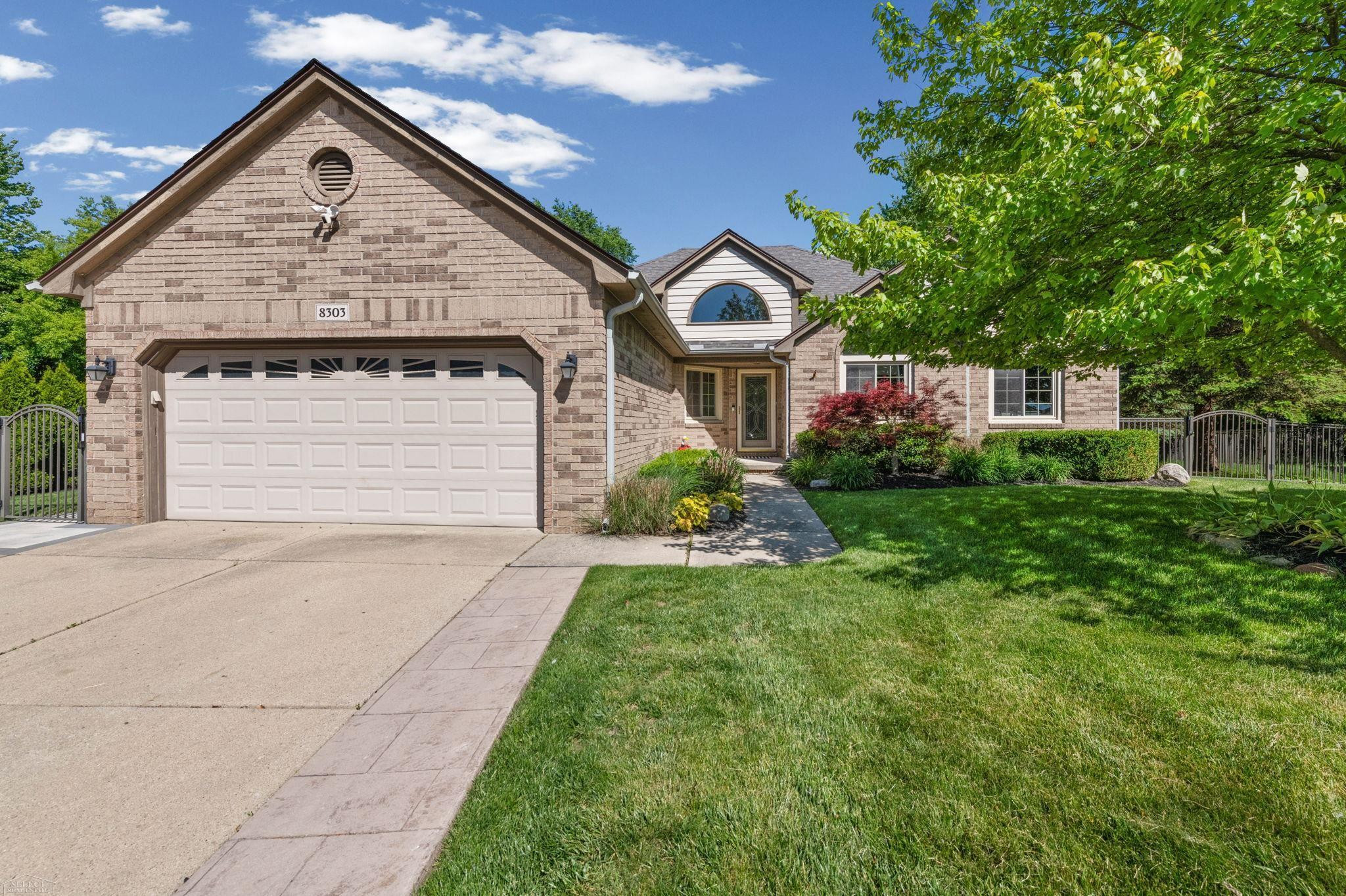 8303 Frederick Drive, Washington, MI — front exterior
