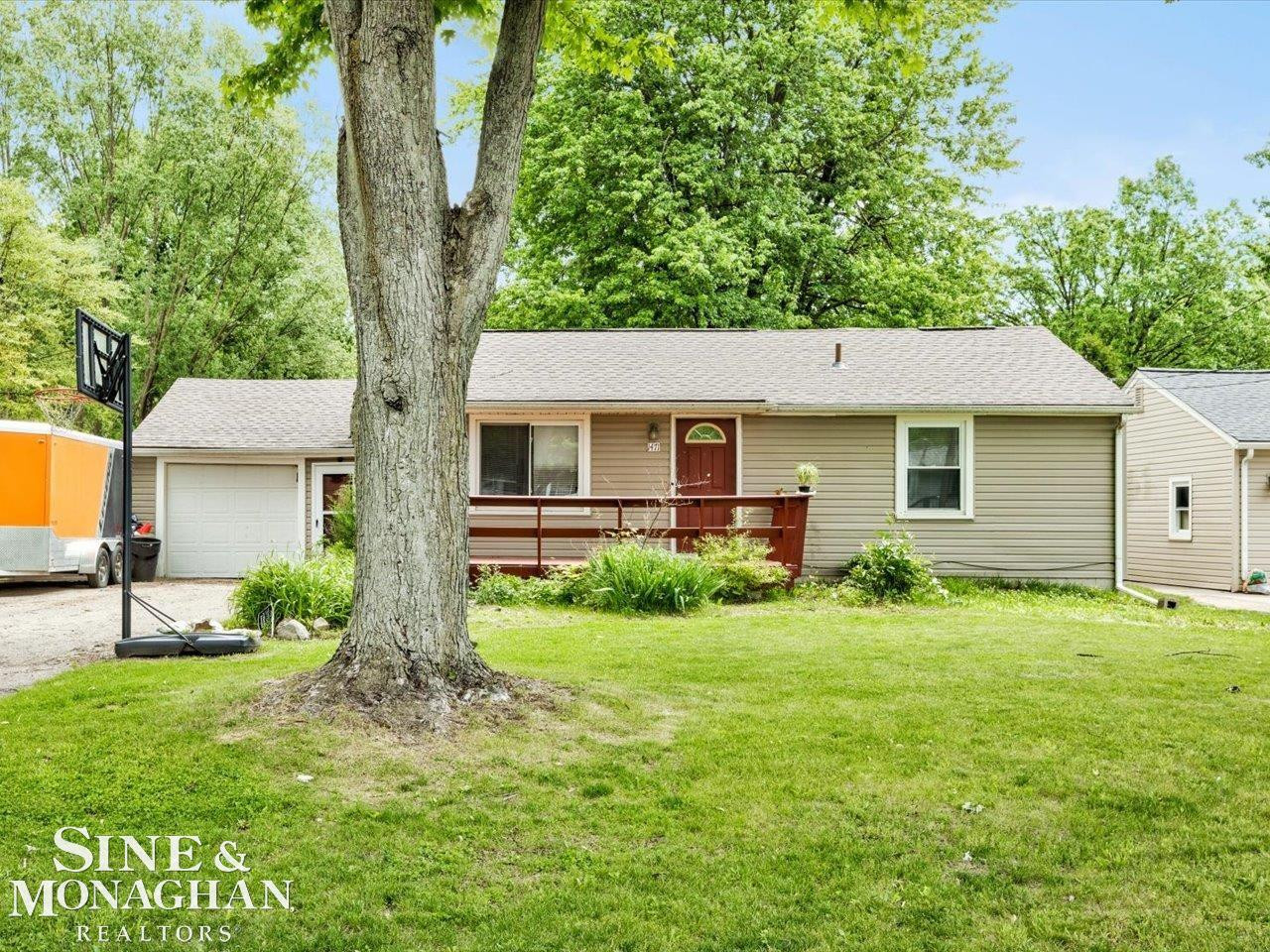 1471 S Packard Avenue, Burton, MI 48509 — front exterior