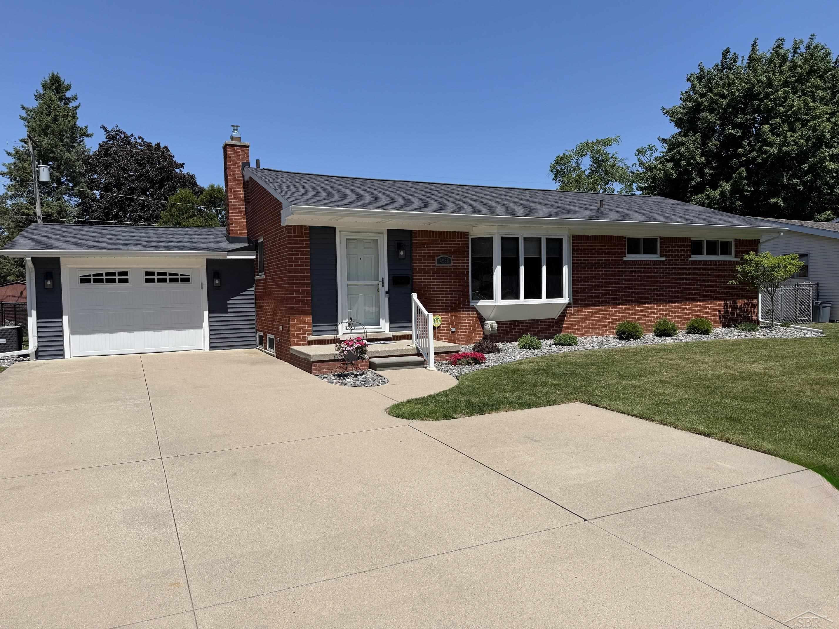4938 Buckthorne Drive, Saginaw, MI 48603 — front exterior