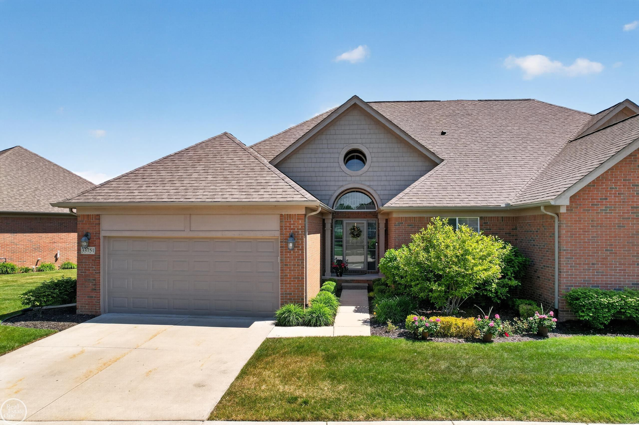 33751 Au Sable Drive, MI 48047 — front exterior