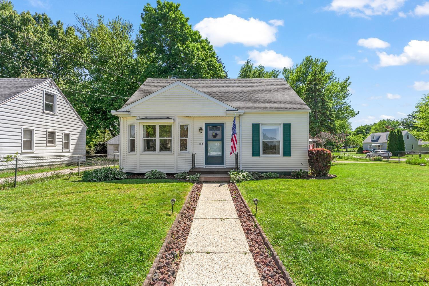 583 Riverside Avenue, Adrian, MI 49221 — front exterior