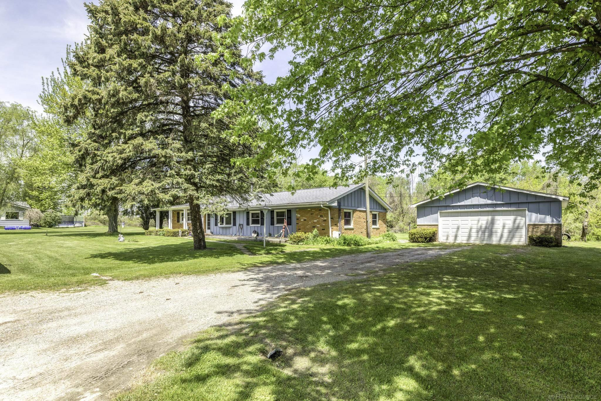 5950 Avalon Circle, Lexington, MI 48059 — front exterior
