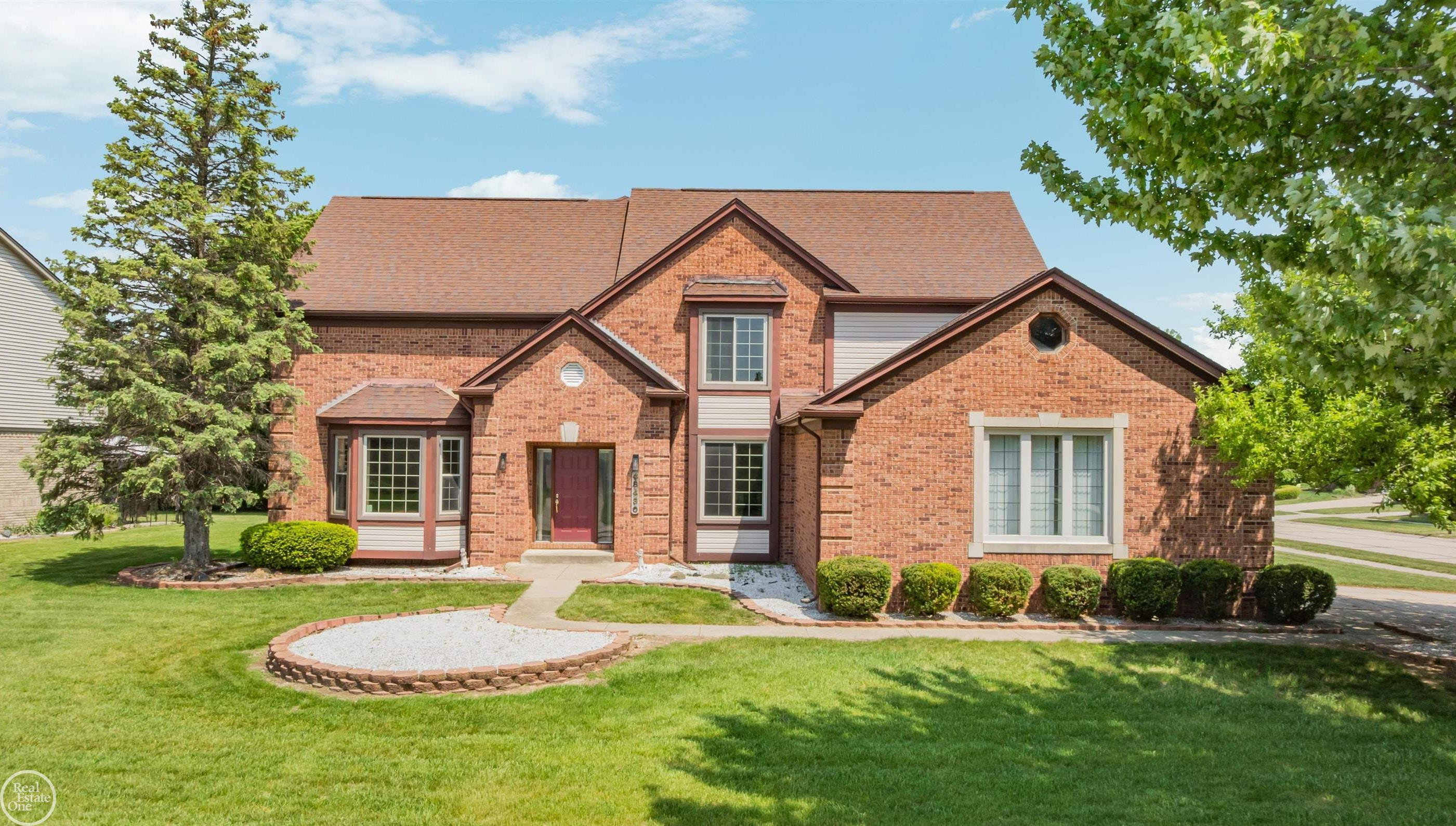 48430 Montelepre Drive, Shelby Twp, MI 48315 — front exterior