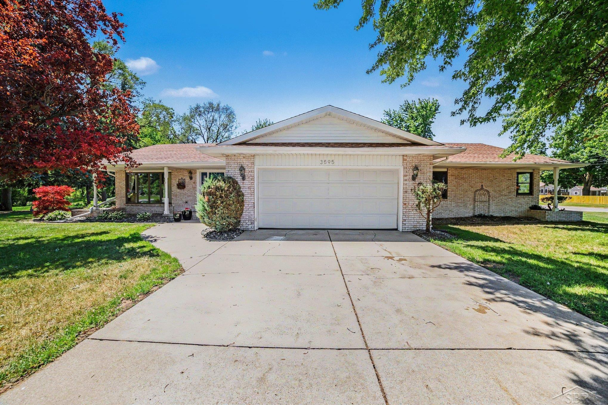 3595 Hermansau Drive, 2211 Hetzner, Saginaw, MI 48603 — front exterior