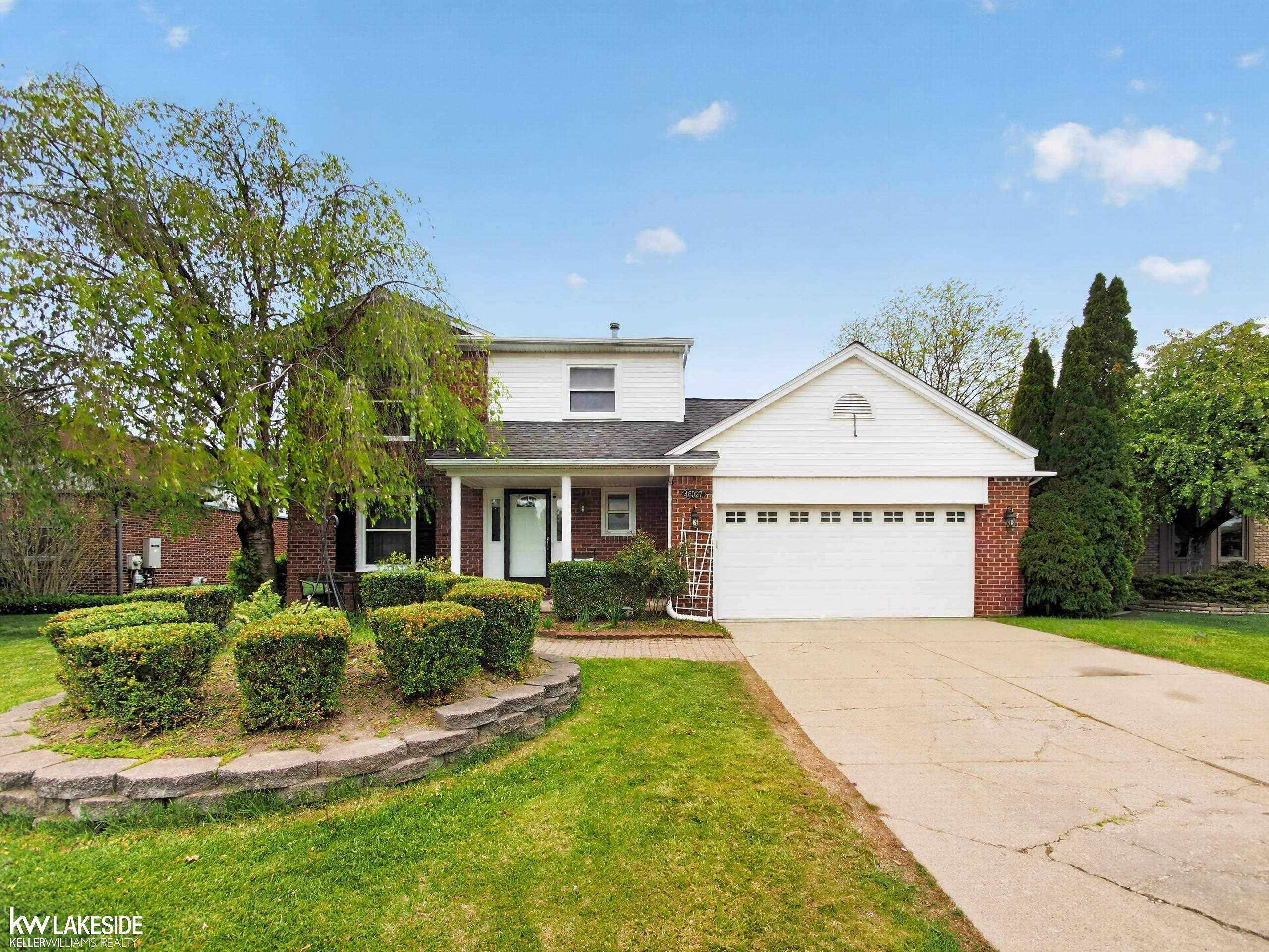 46027 Tally Ho Drive, Macomb, MI 48044 — front exterior