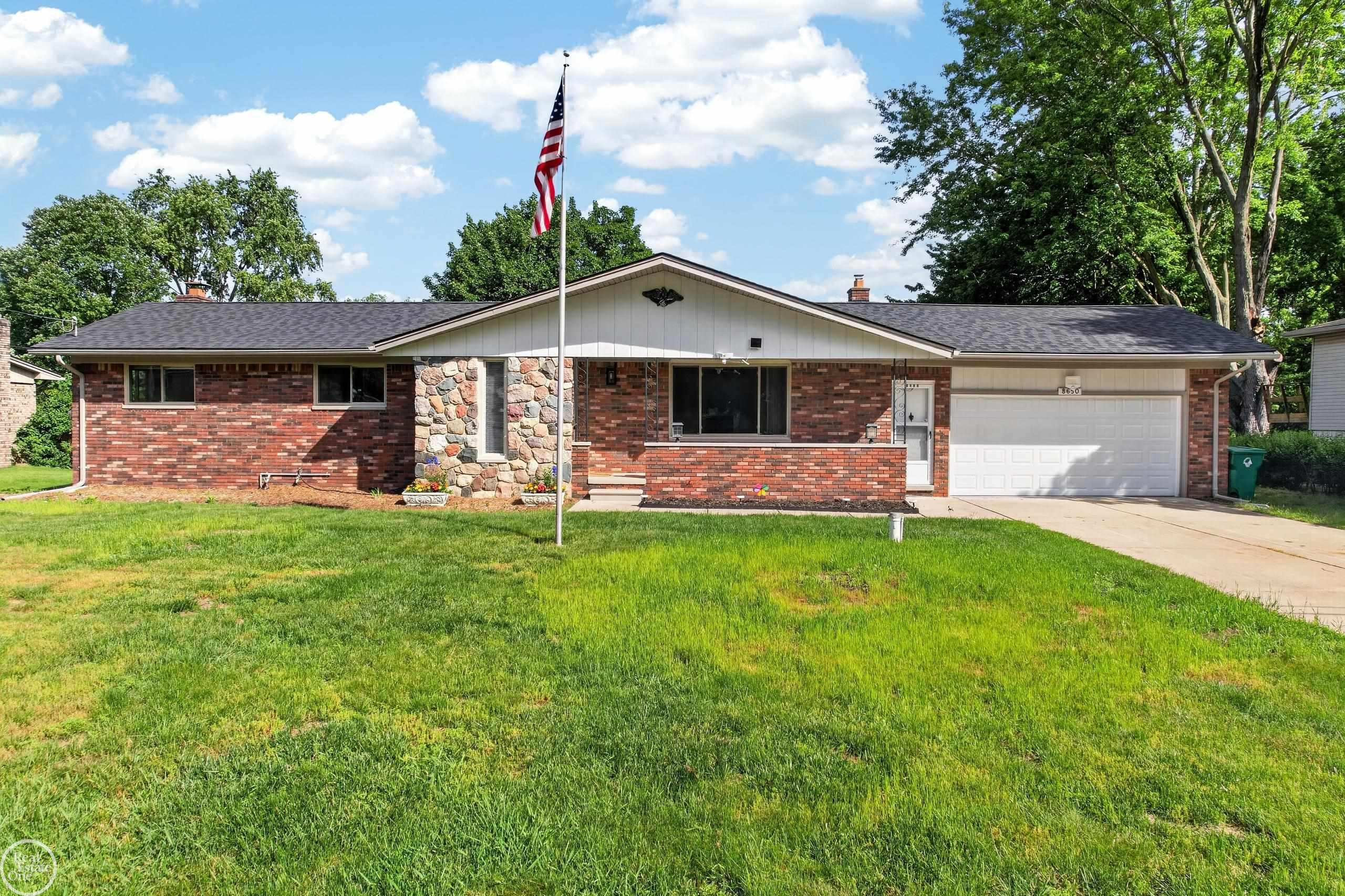8650 Sandy Crest Drive, White Lake, MI — front exterior
