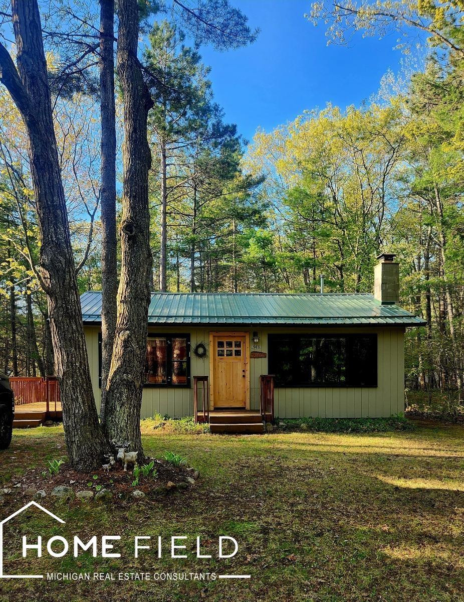 15431 Summer Lane, Ocqueoc, MI 49759 — front exterior