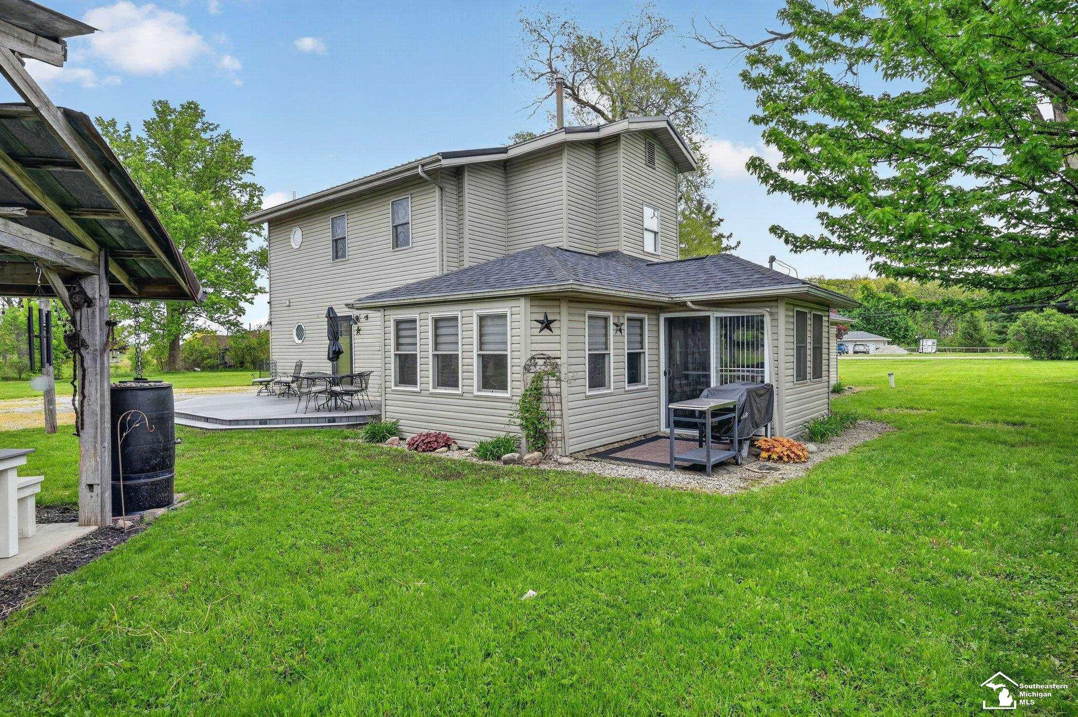 9799 Sylvania Petersburg Road, MI 49267 — front exterior