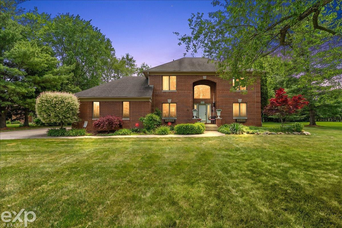 61334 Country Lane, Washington, MI — front exterior