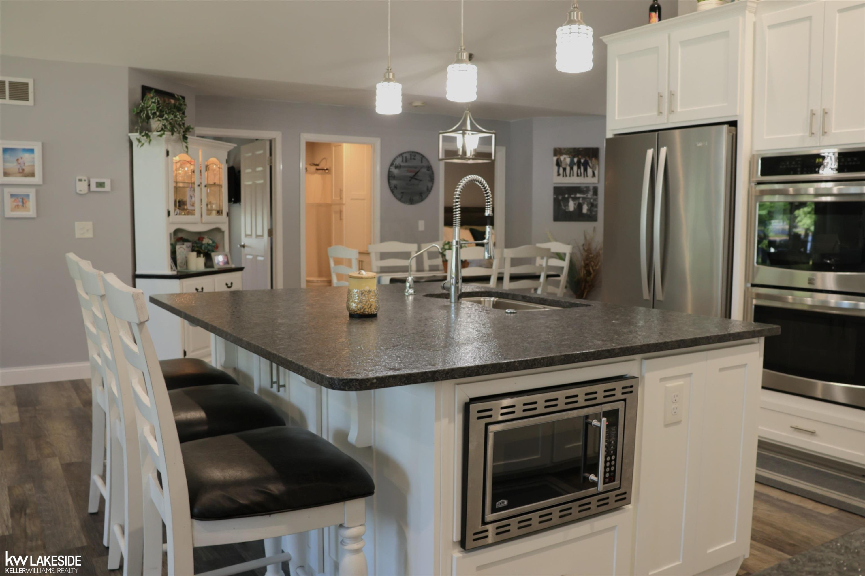 521 W River Court, Gladwin, MI 48624 — Photo 8