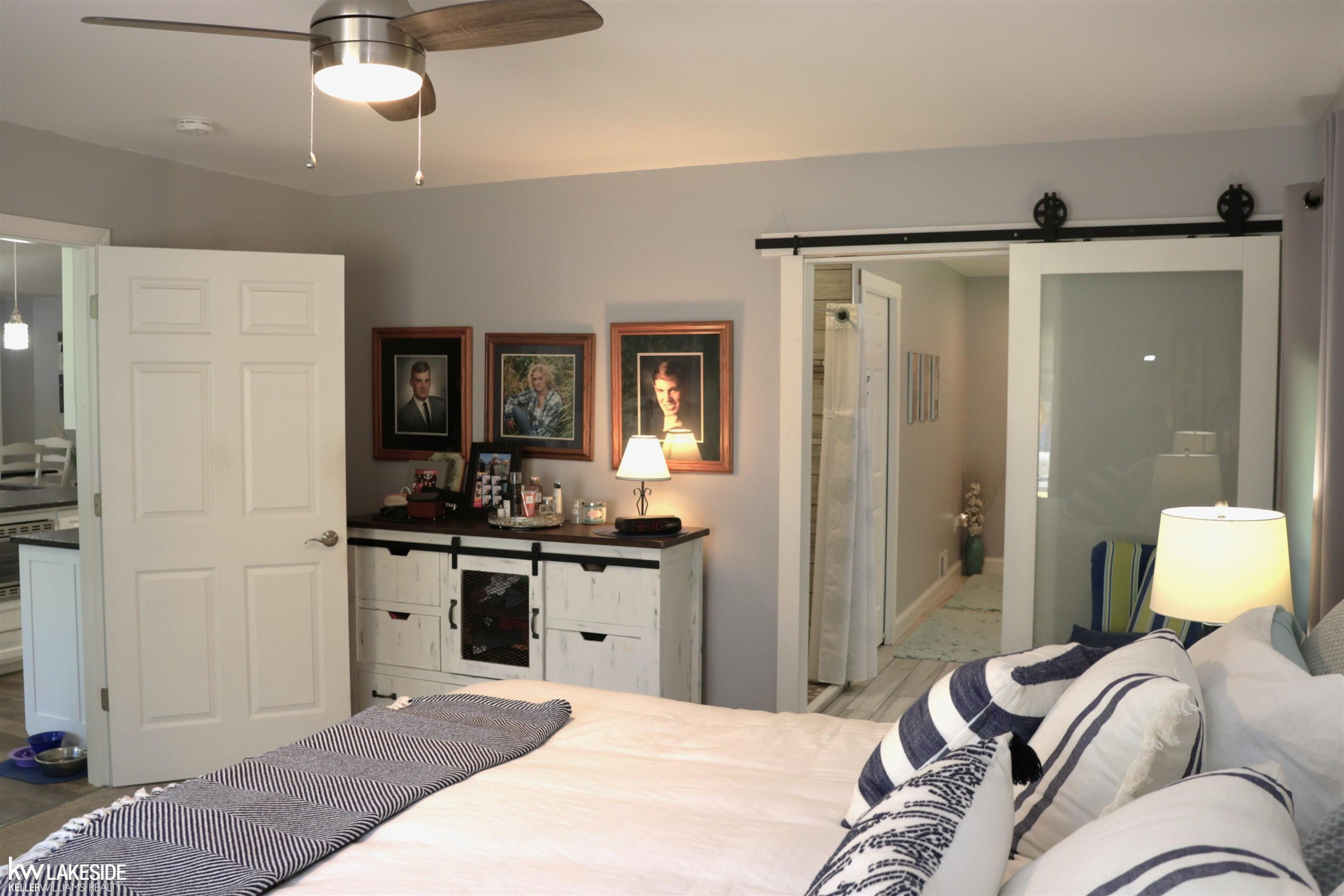 521 W River Court, Gladwin, MI 48624 — Photo 23
