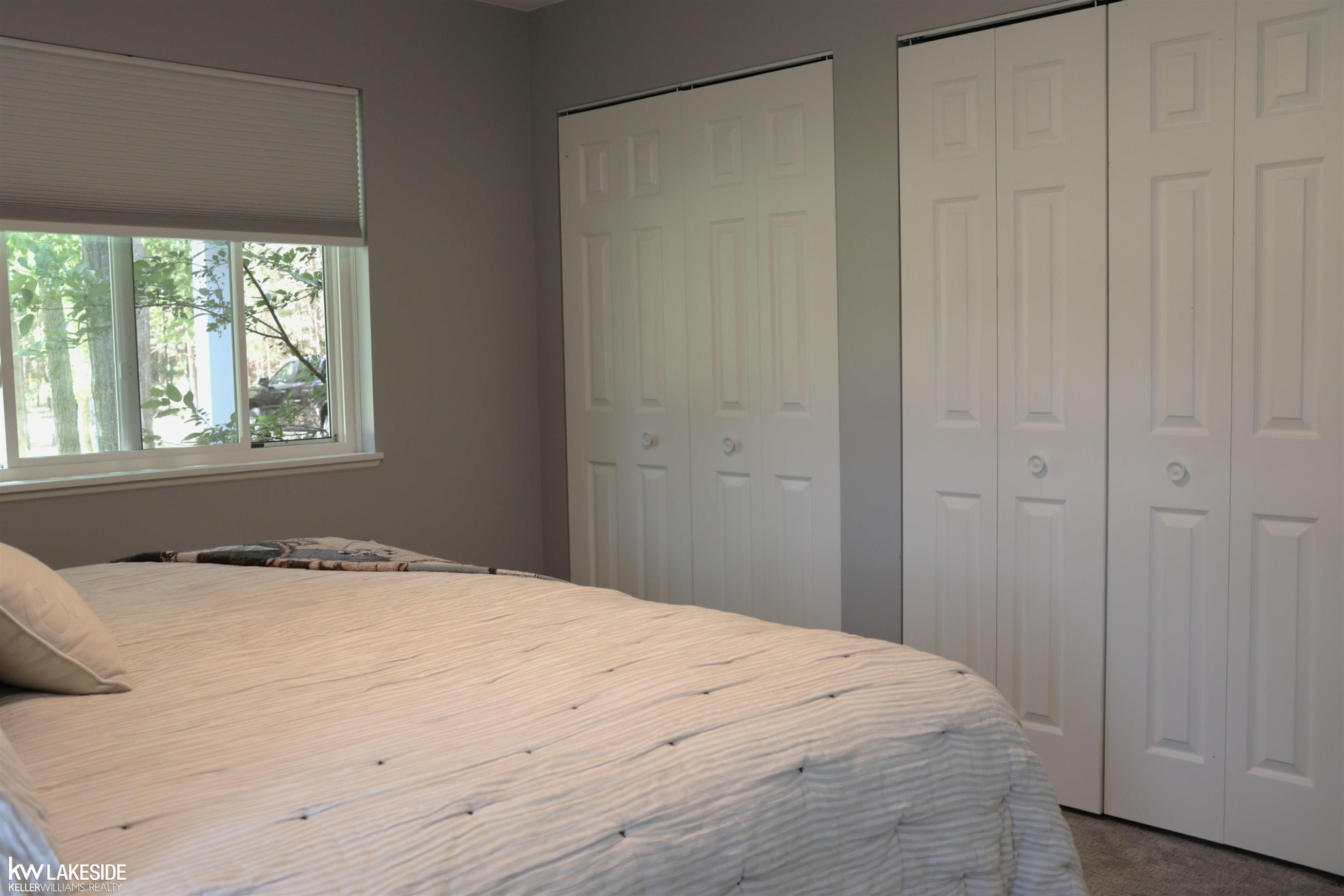 521 W River Court, Gladwin, MI 48624 — Photo 33