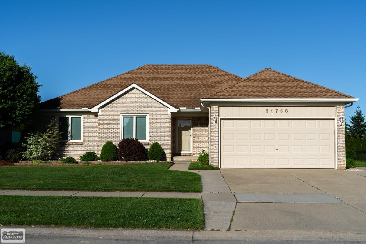 51768 Blue Spruce Drive, Macomb, MI 48042 — front exterior