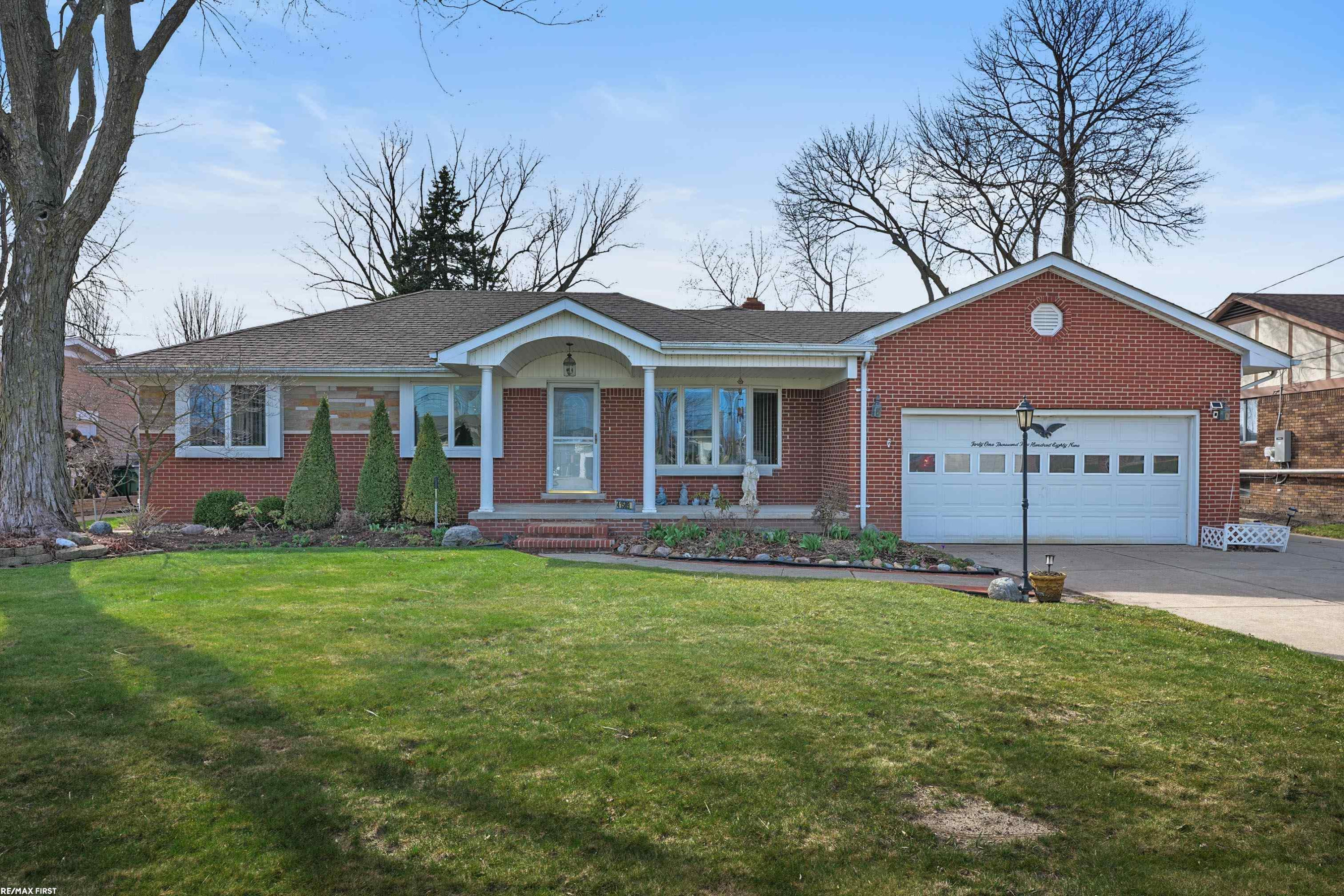 41589 Windmill Street, MI — front exterior