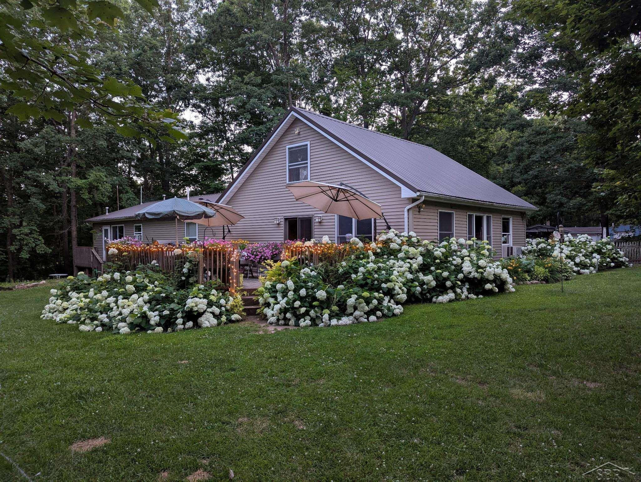 1969 Barbara Lane, Harrison, MI 48625 — front exterior