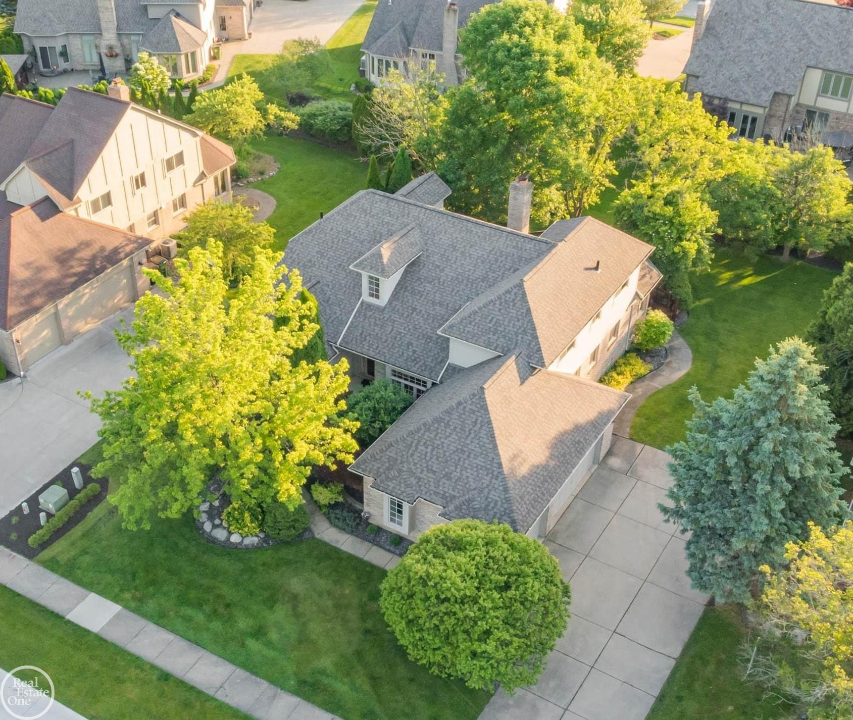 55261 Kingsway Drive, Shelby Twp, MI 48316 — front exterior