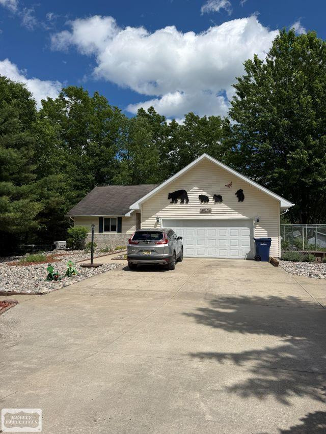 6651 Tamarack Trail, Lake, MI 48632 — front exterior