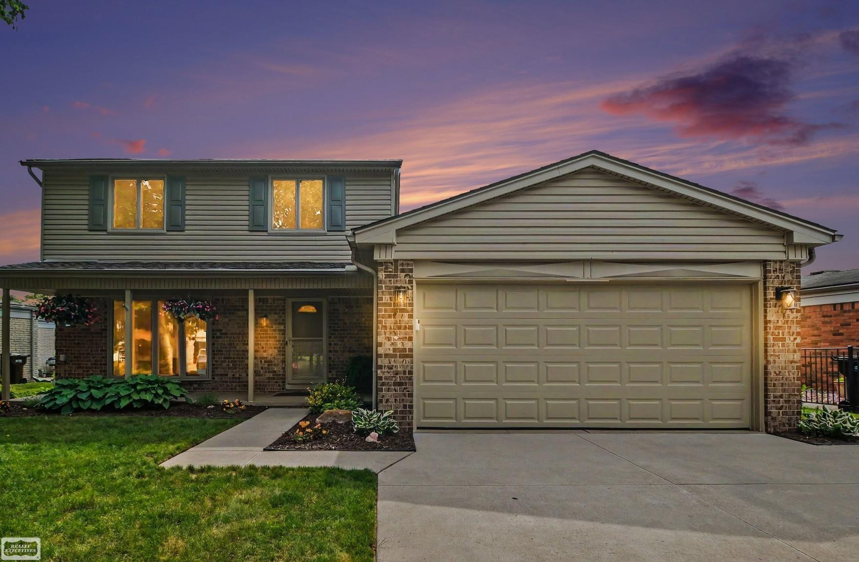 39696 Timberlane Drive, Sterling Heights, MI 48310 — front exterior