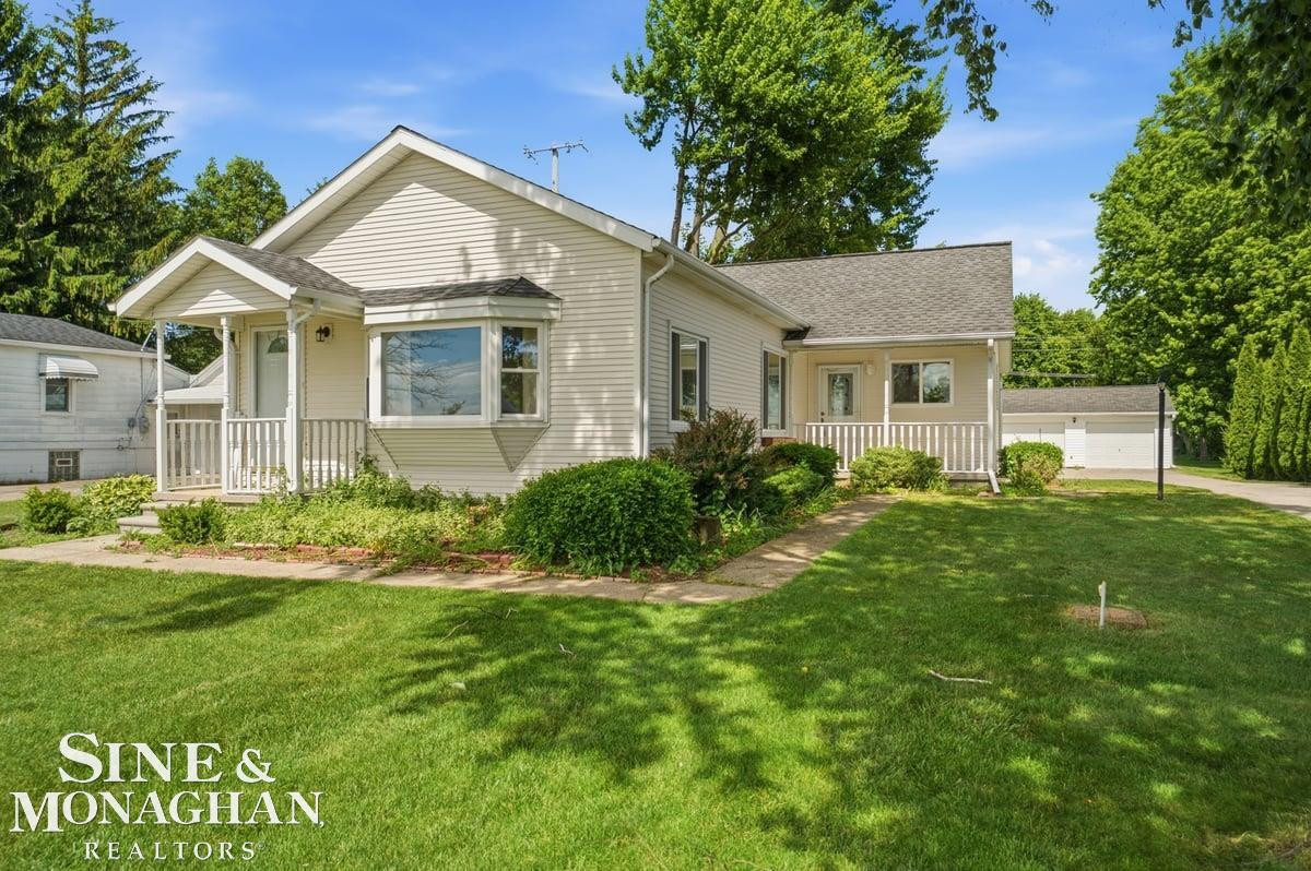 6036 River Road, MI — front exterior