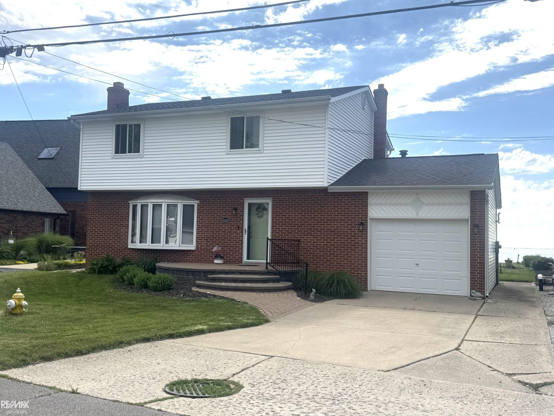 46960 Jans Drive, Chesterfield, MI 48047 — front exterior