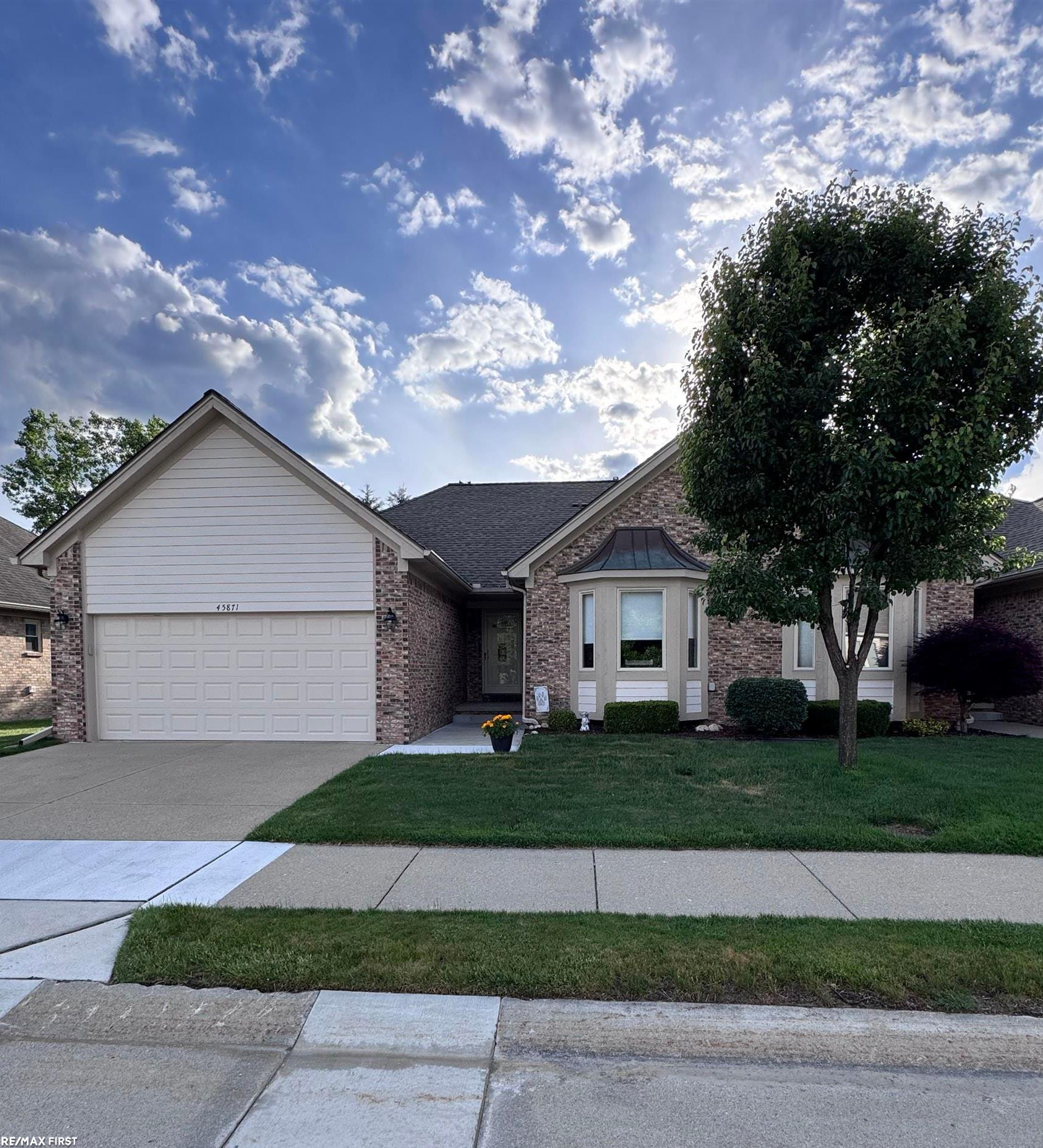 45871 Karam Drive, Shelby Twp, MI 48315 — front exterior