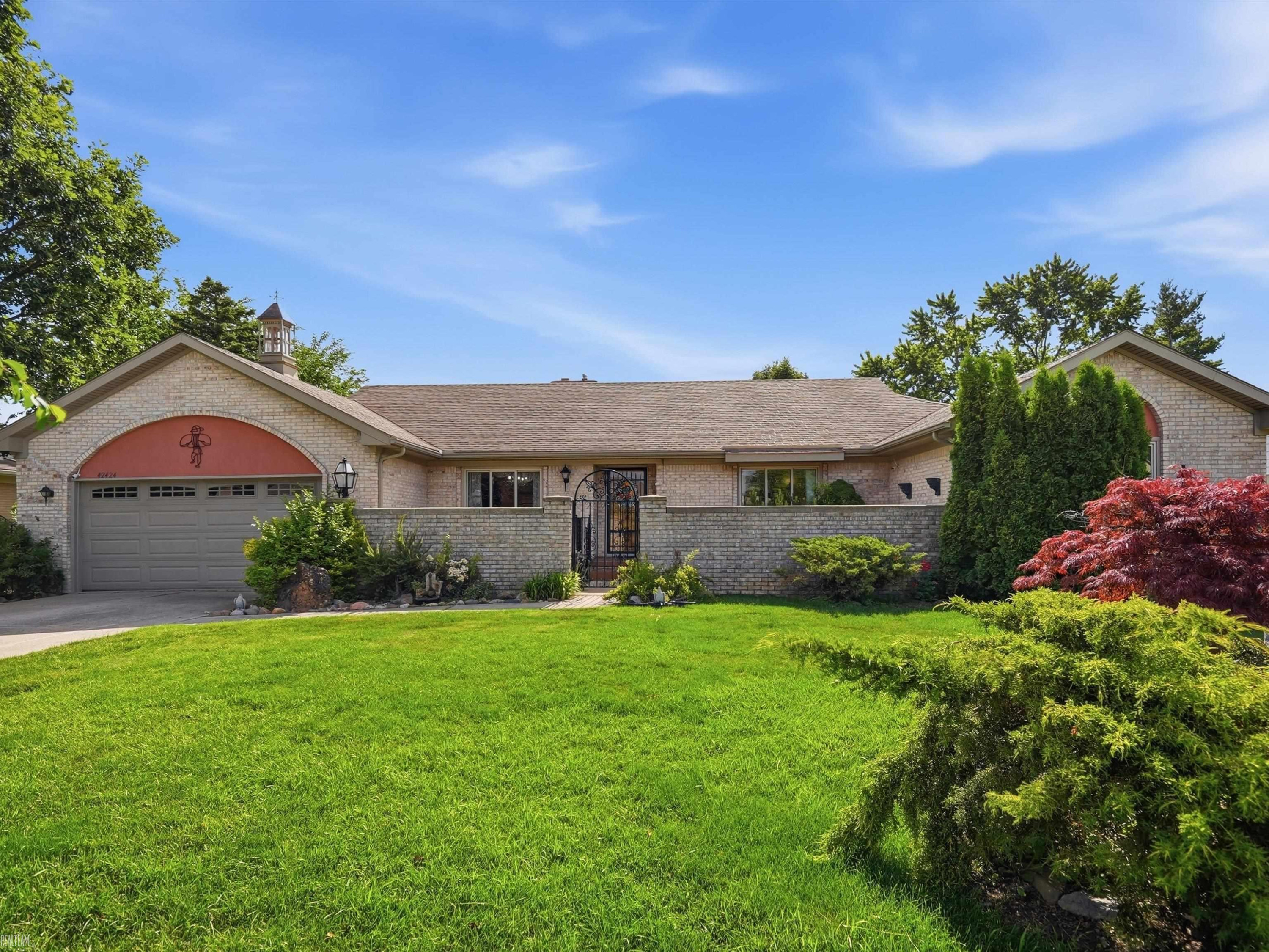 42424 Tessmer Drive, Sterling Heights, MI 48314 — front exterior