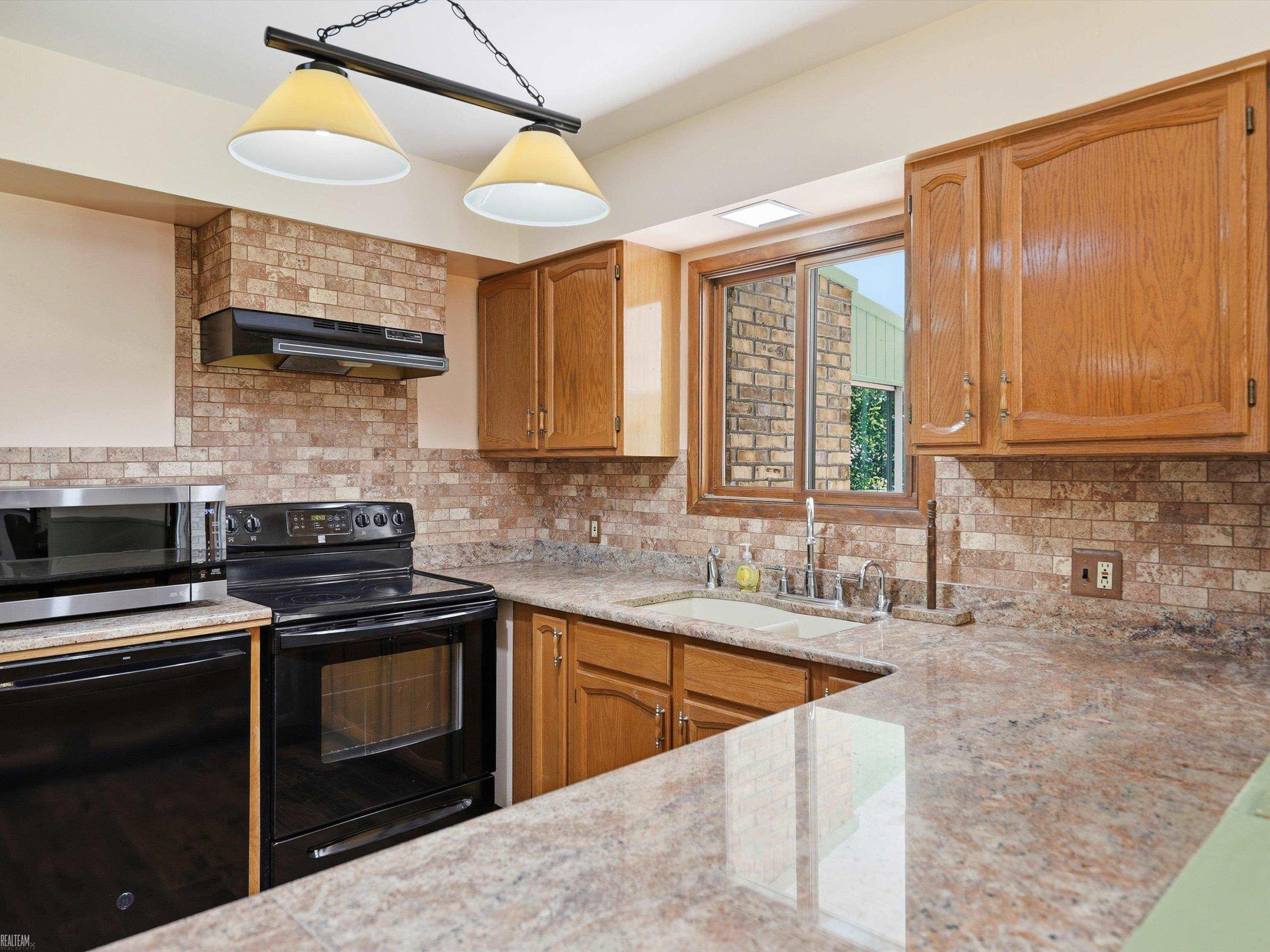 42424 Tessmer Drive, Sterling Heights, MI 48314 — Photo 16