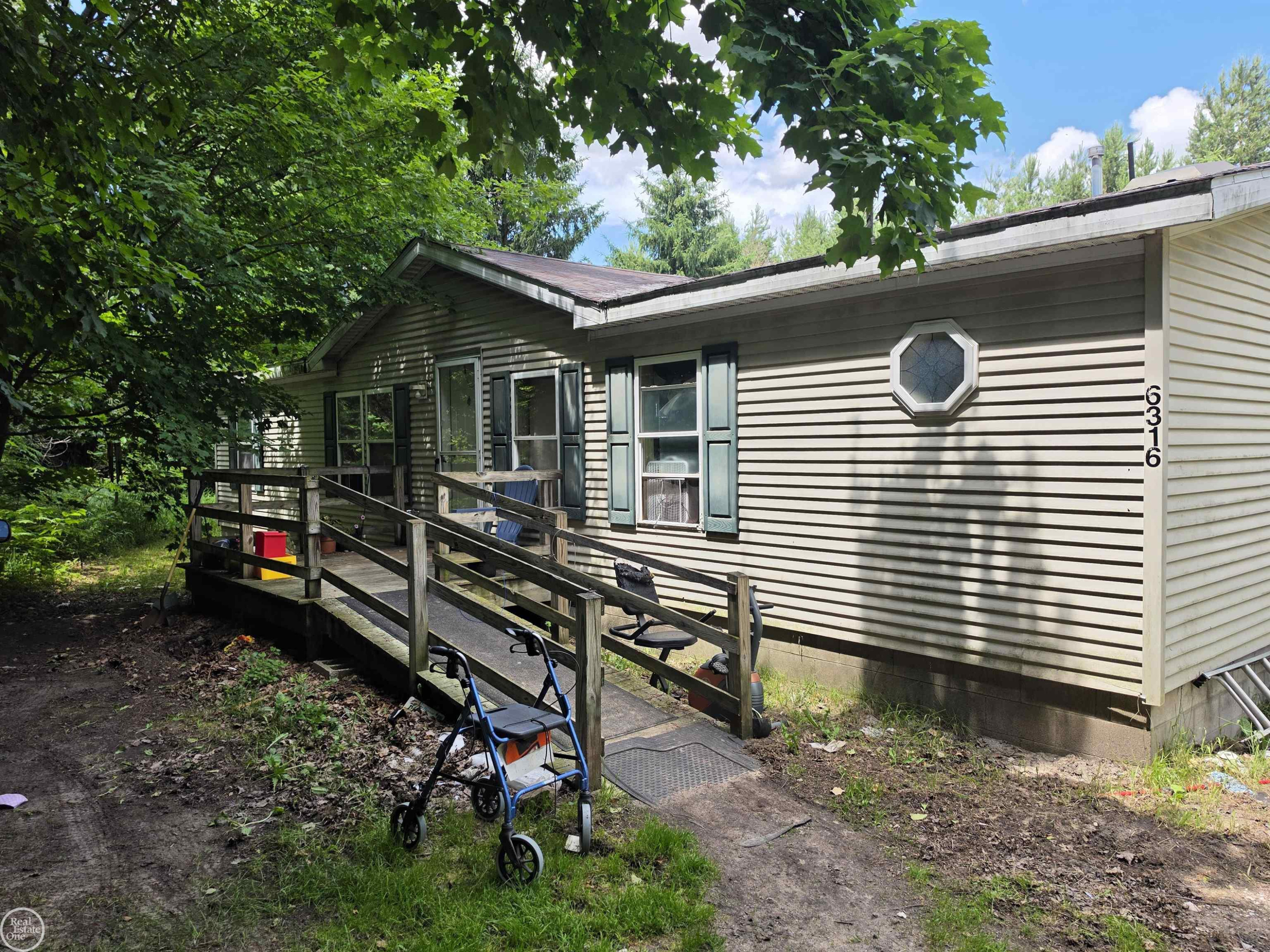 6316 W 18 Road, Mesick, MI 49668 — front exterior