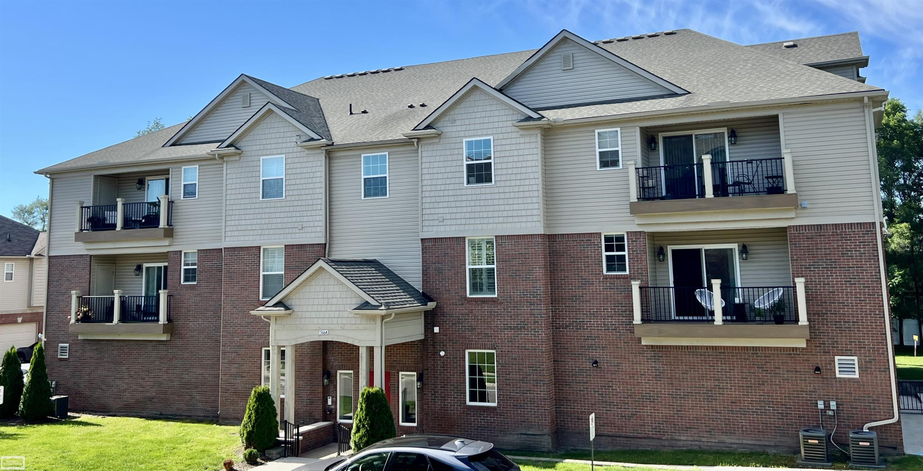 5656 Flagstaff Pines Drive, 402, Shelby Twp, MI 48317 — front exterior