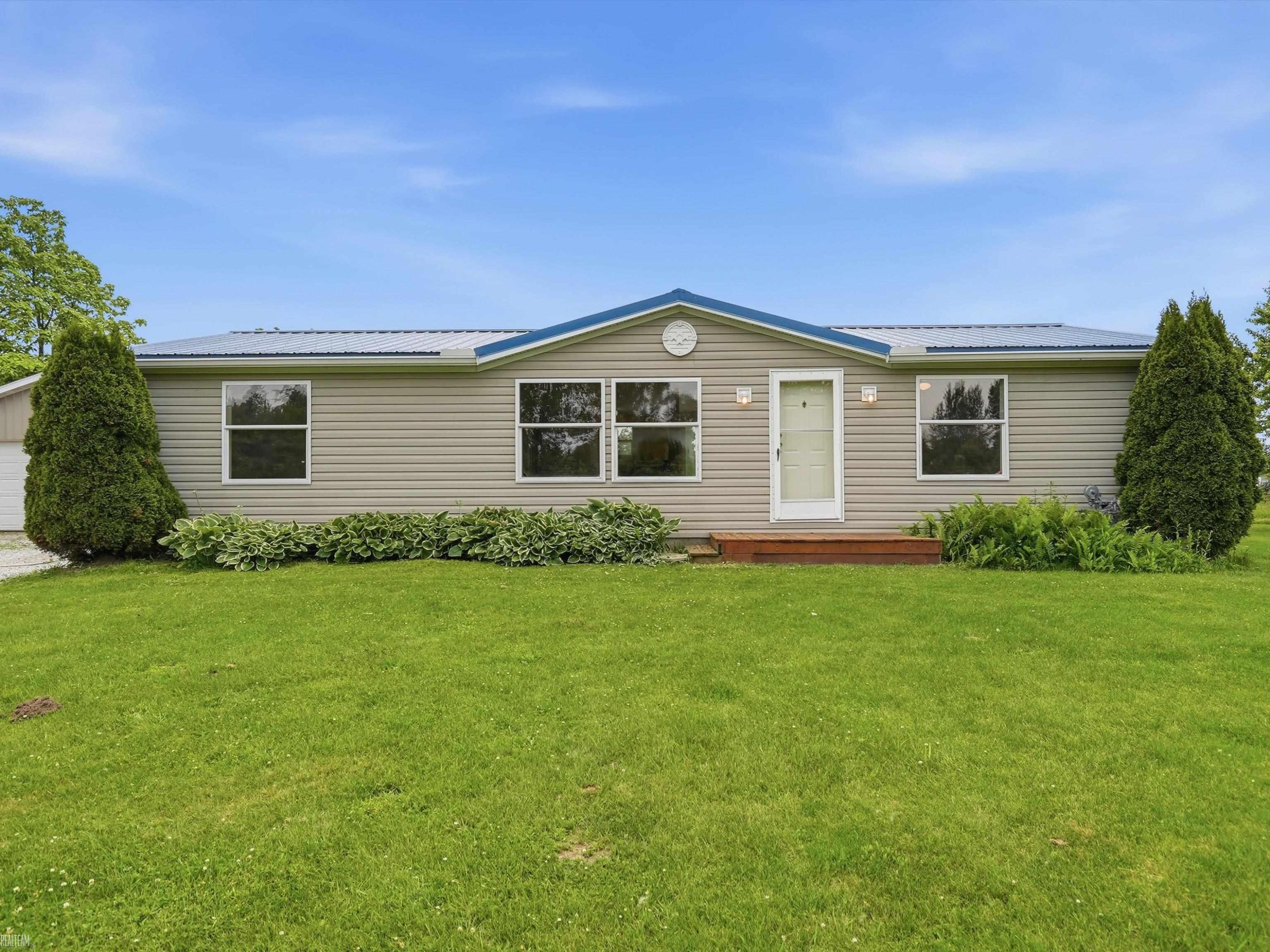 8137 Marquette Road, MI — front exterior