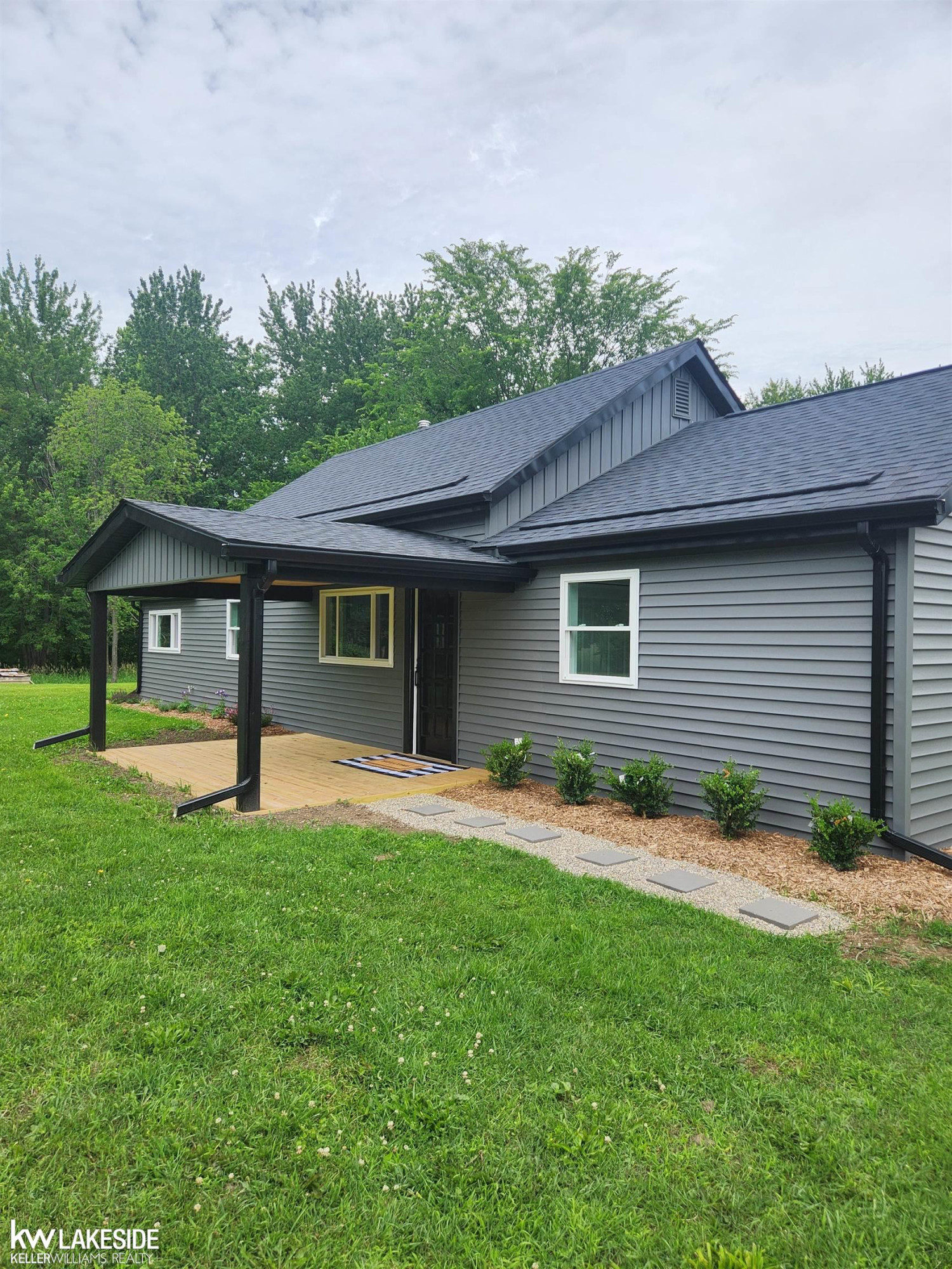 69870 Wolcott Road, MI — front exterior