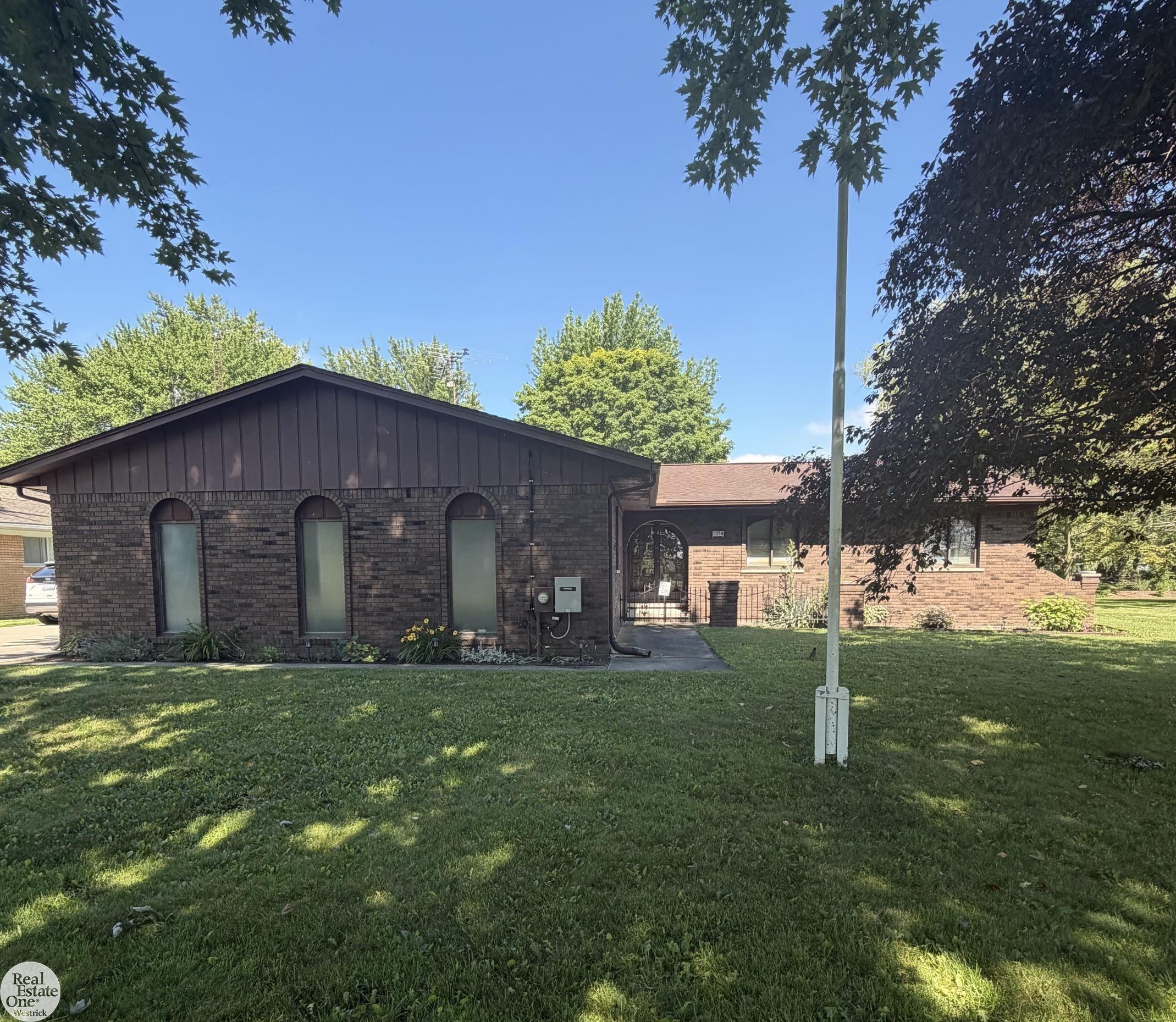 5374 Pointe Drive, MI — front exterior