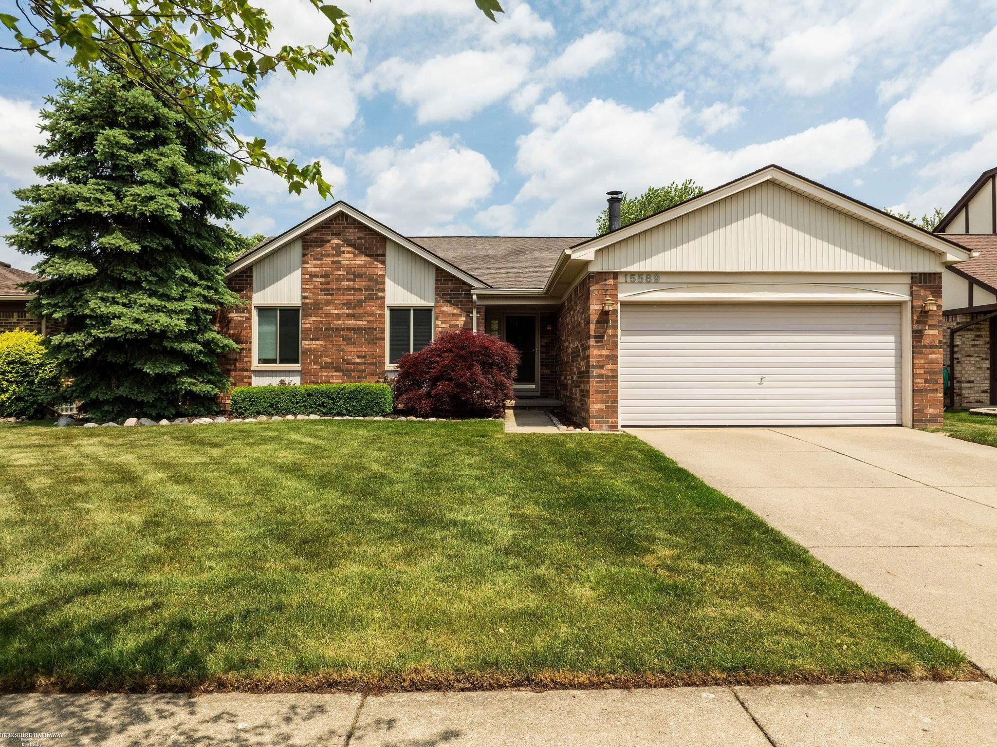 15589 Winter Park Drive, MI 48044 — front exterior