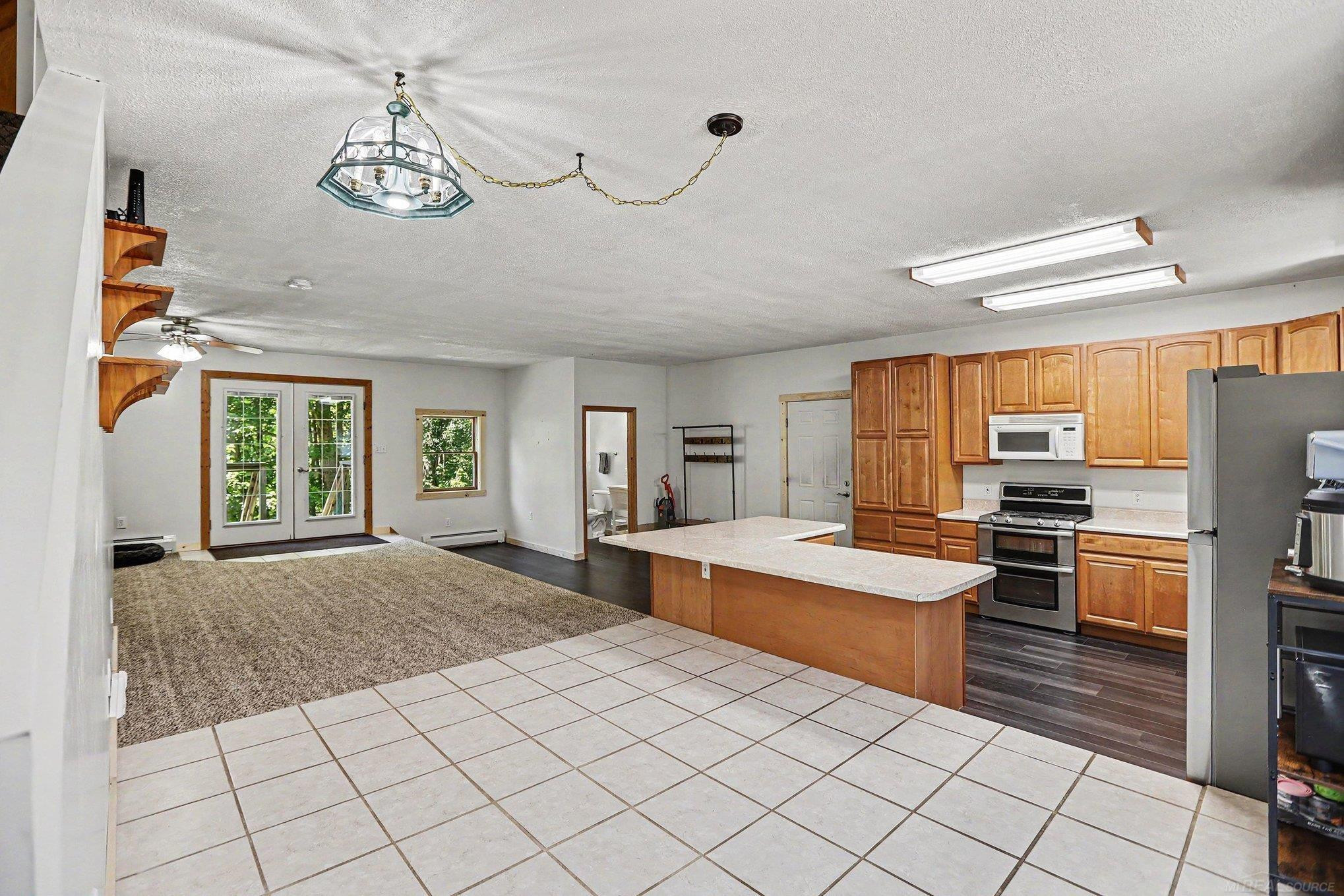 2263 Elder Road, Carp Lake, MI 49718 — Photo 10