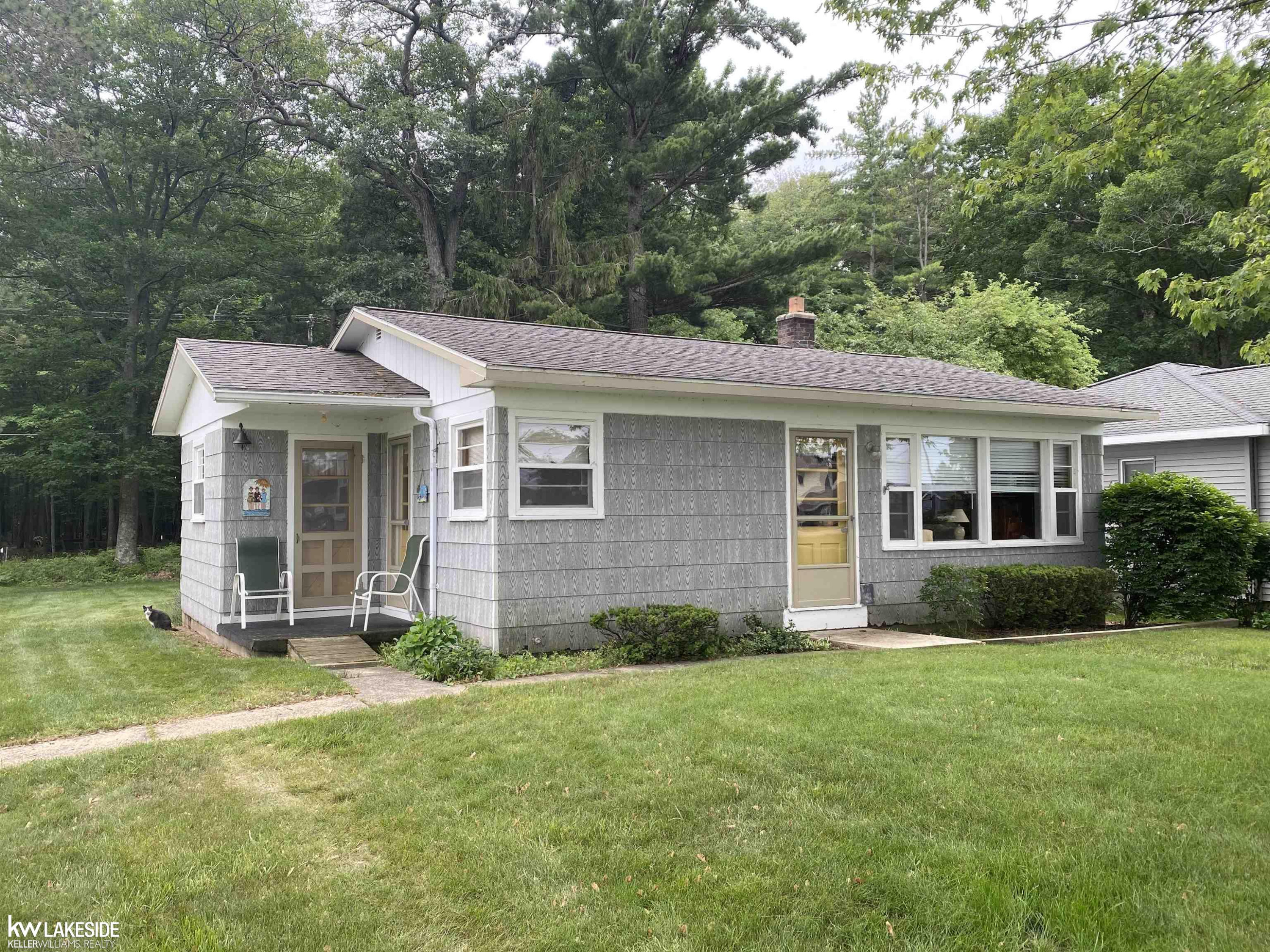 7637 Port Austin Road, MI — front exterior