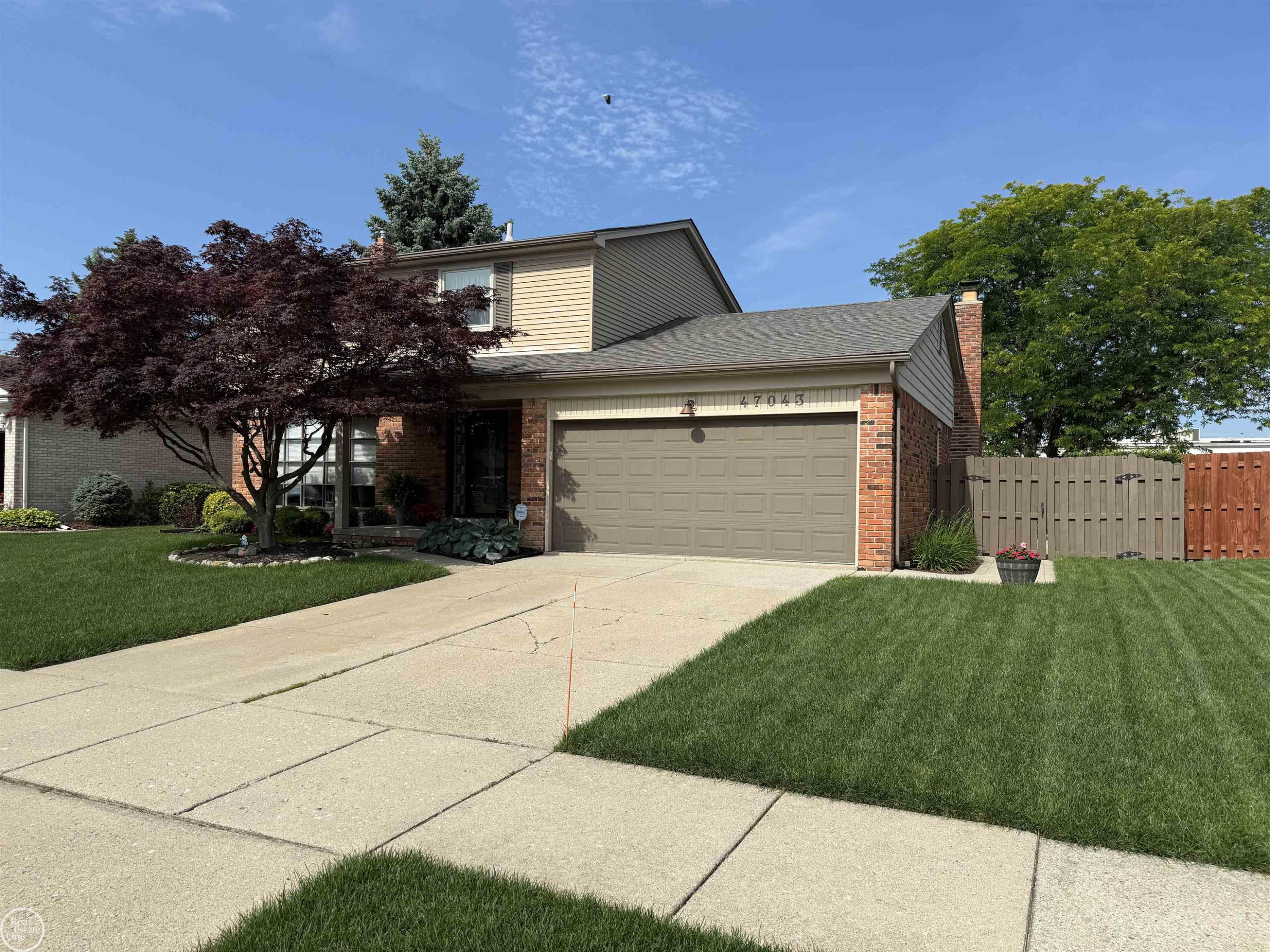 47043 Sanborn Drive, Macomb, MI 48044 — front exterior