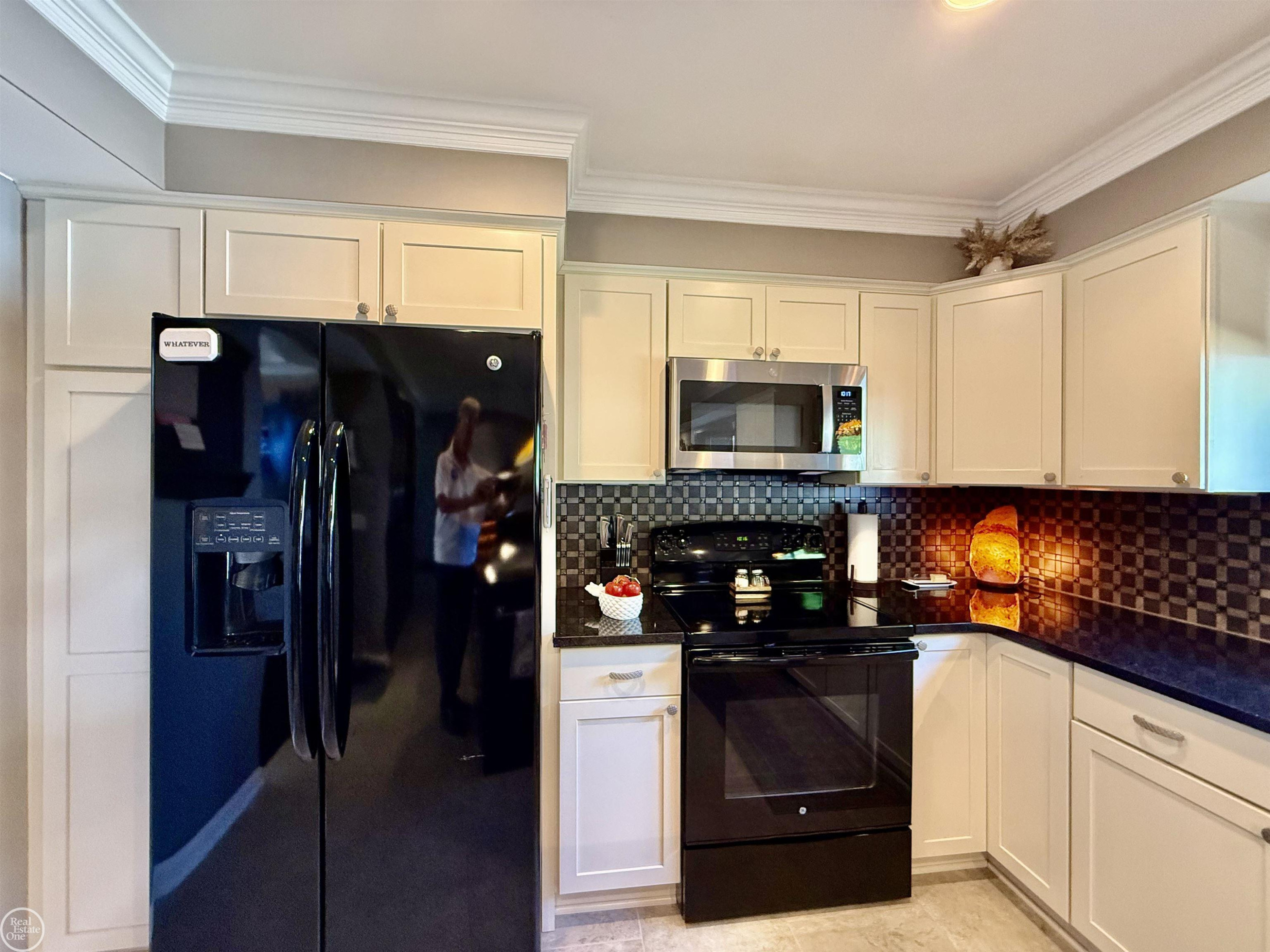 47043 Sanborn Drive, Macomb, MI 48044 — Photo 34