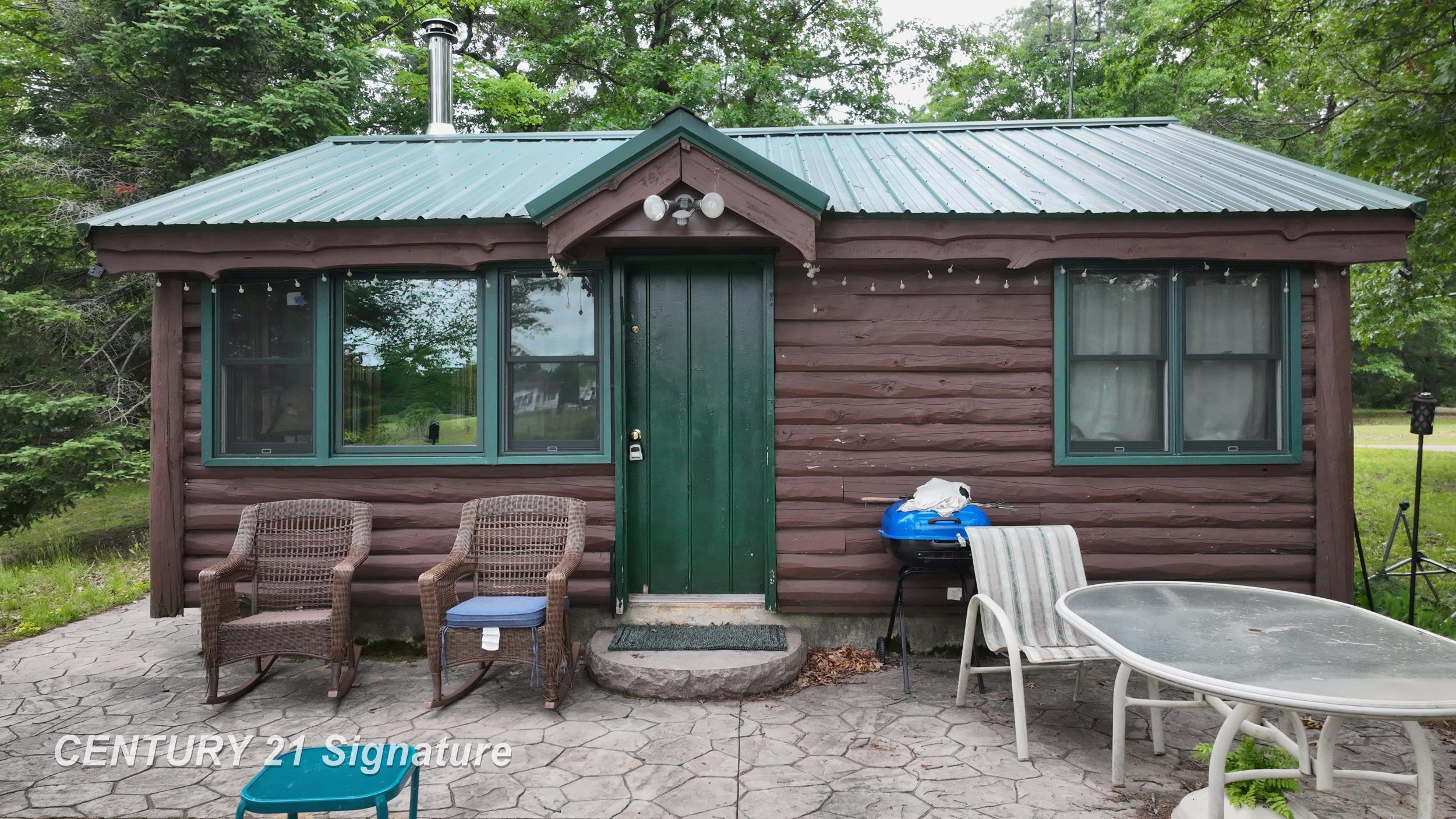 751 E Long Lake Drive, Harrison, MI 48625 — front exterior