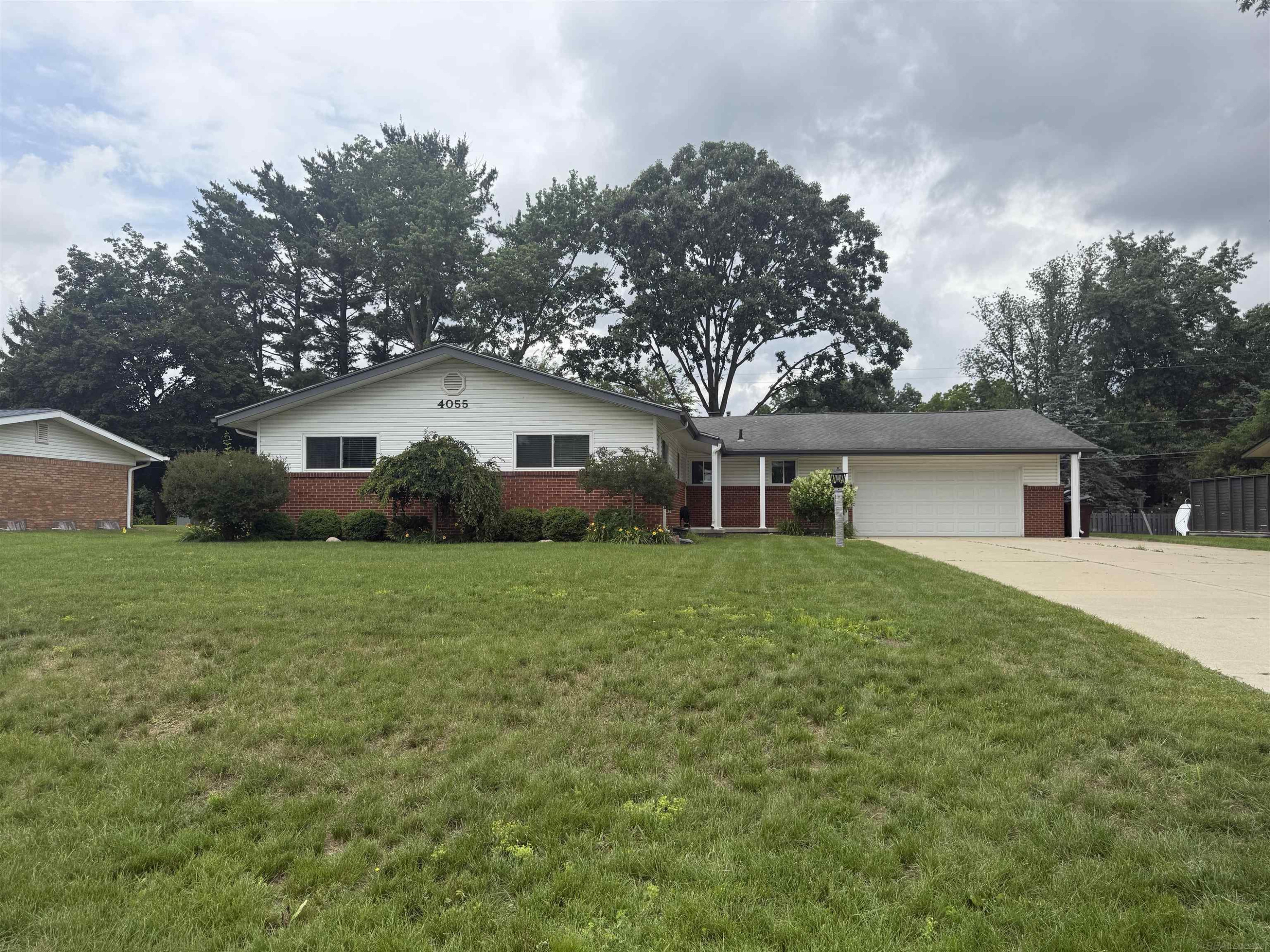 4055 Sandy Creek Drive, Utica, MI 48316 — front exterior