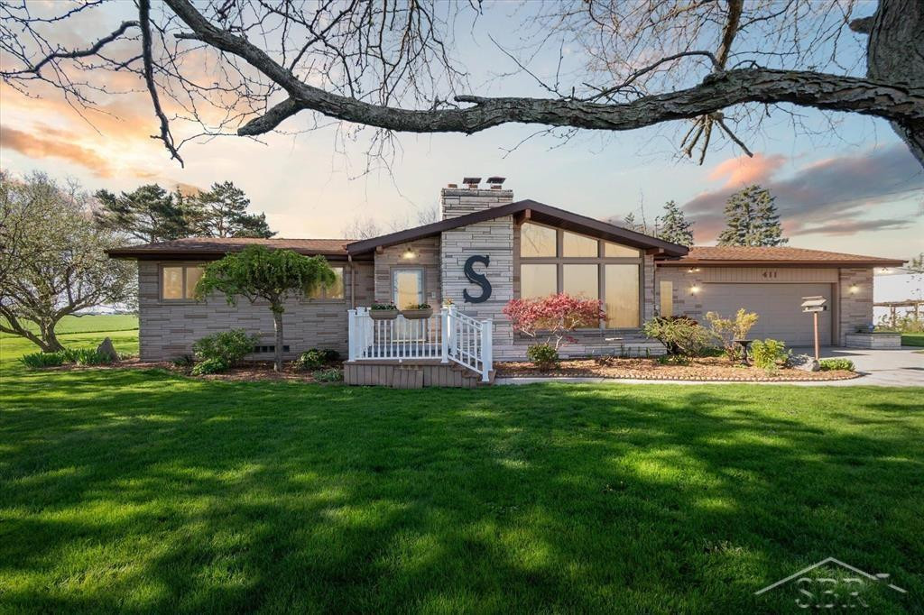411 W Markel Road, MI — front exterior
