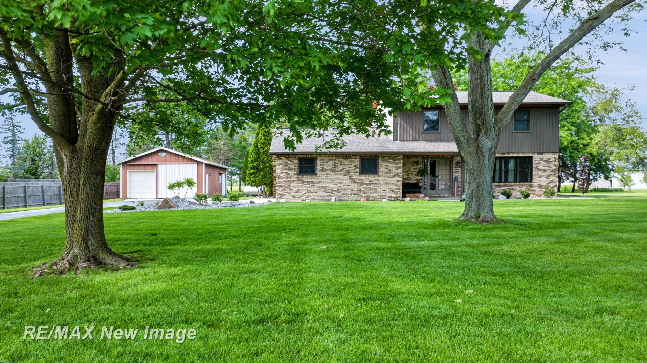 6180 W Freeland Road, Freeland, MI 48623 — front exterior