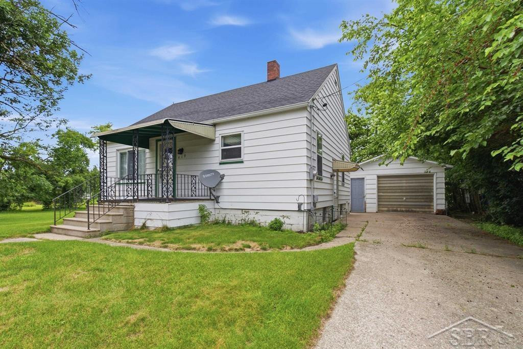 419 S Warren Street, Pinconning, MI 48650 — front exterior