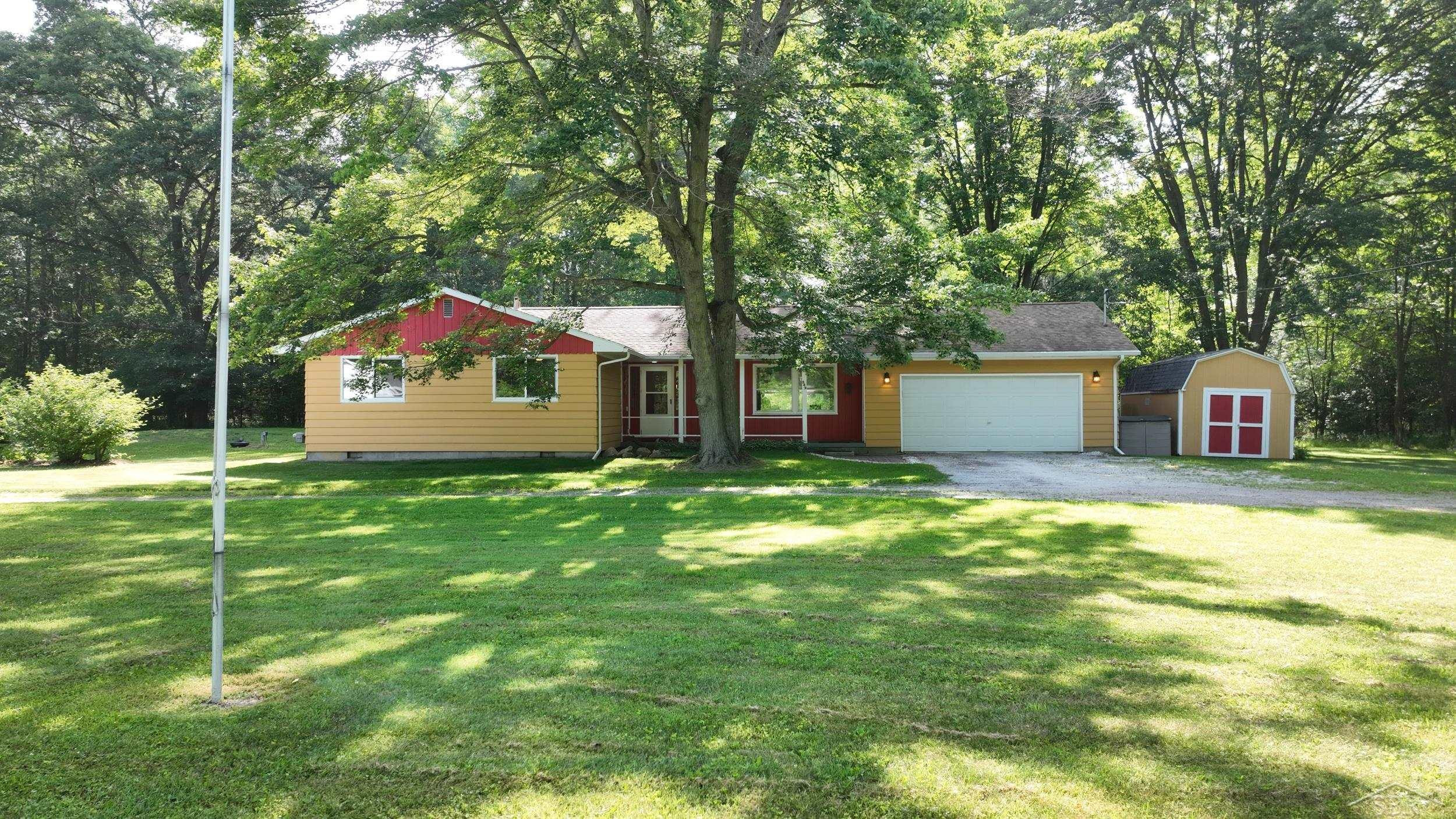 549 S Eight Mile Road, Midland, MI 48640 — front exterior