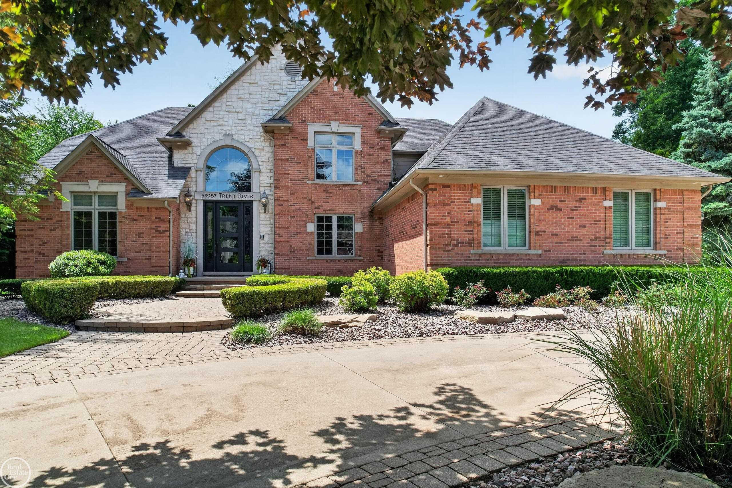 53987 Trent River Drive, Shelby Twp, MI 48315 — front exterior