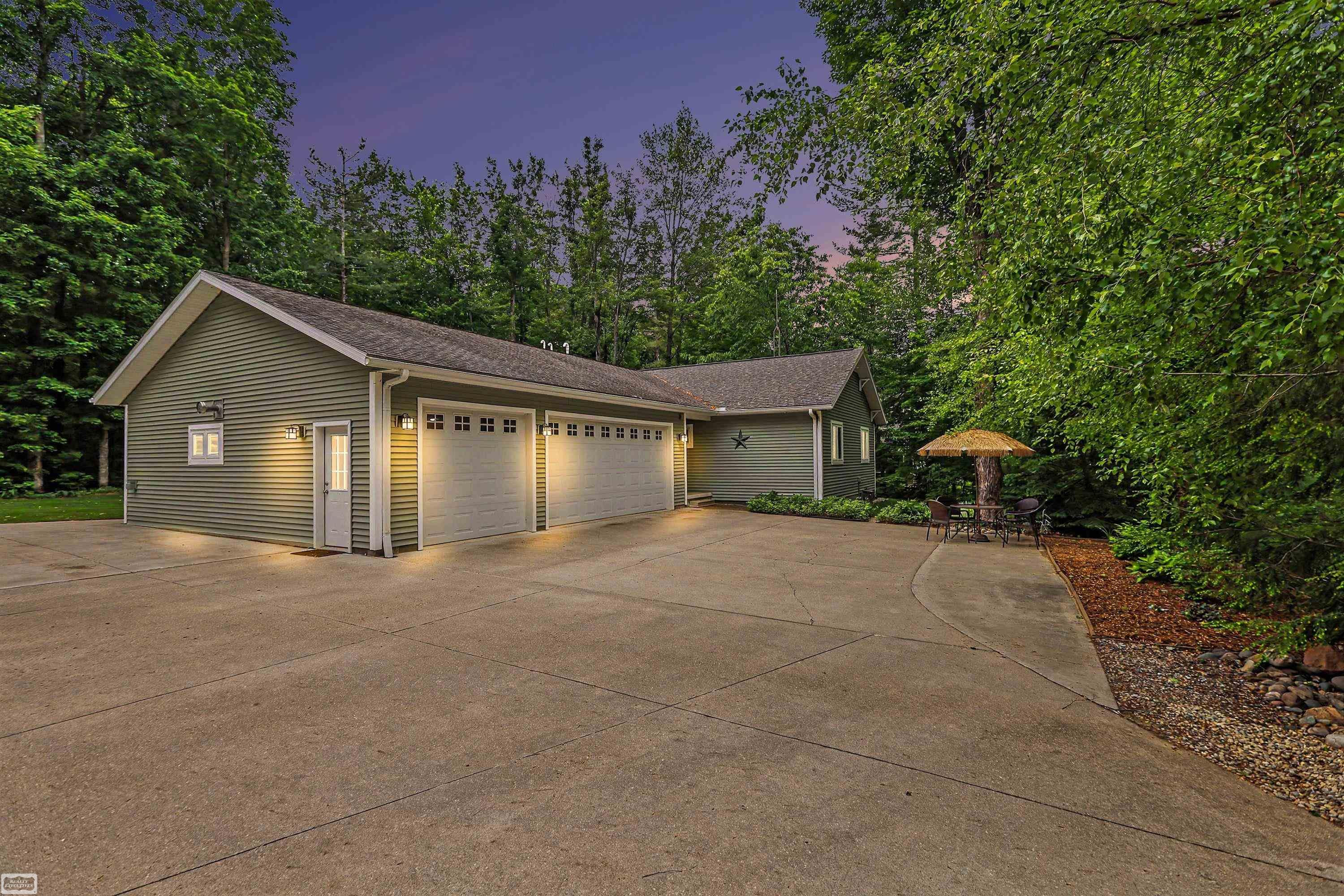 7903 Macatawa Trail, Gaylord, MI 49735 — front exterior